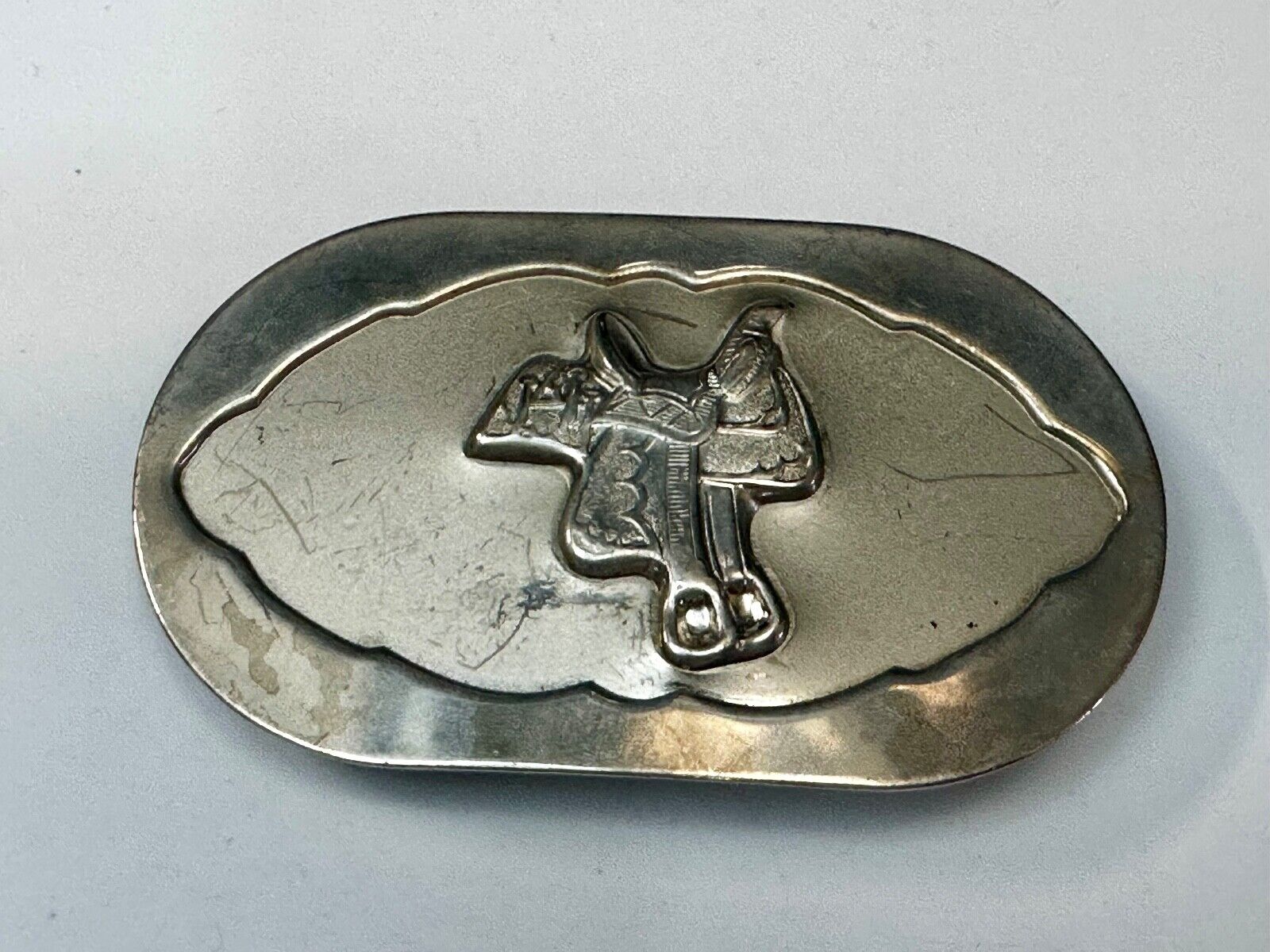 Vintage horse saddle used Belt Buckle to restore