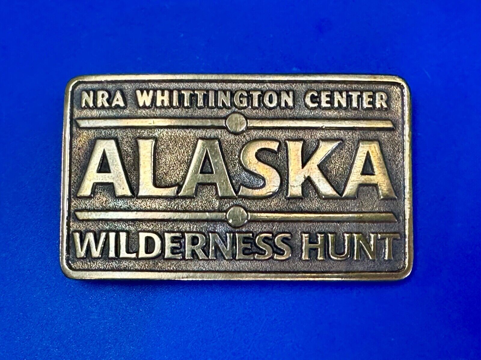 Alaska Wilderness Hunt - vintage belt buckle by NRA Whittington Center