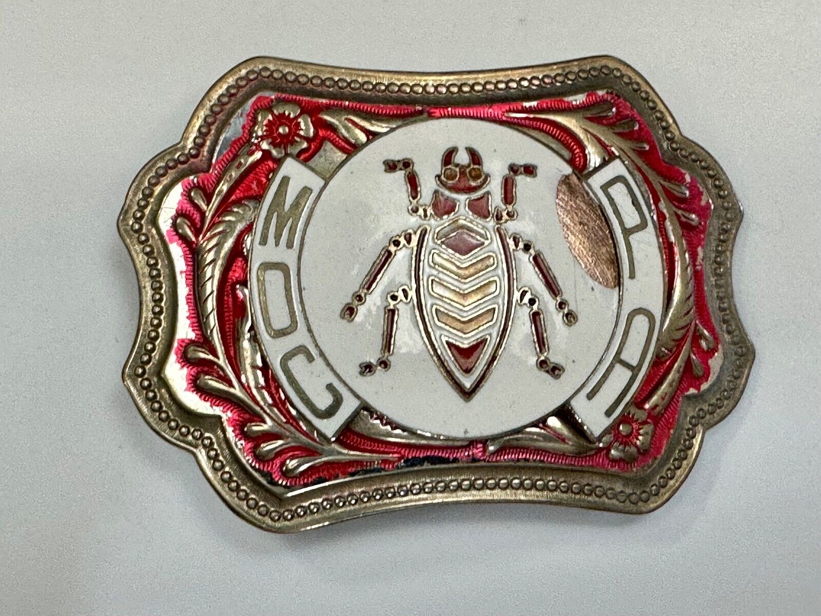 unique insect bug centerpiece on western red & white flower swirl belt buckle