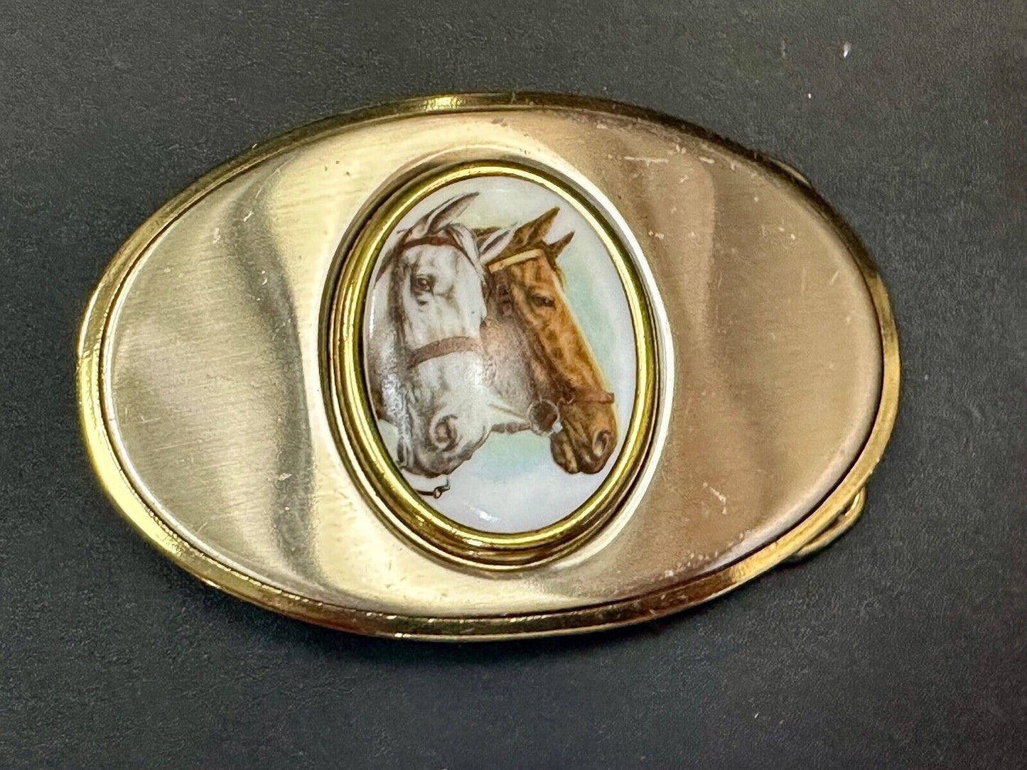 Two horse head picture in oval smooth gold tone Vintage Belt Buckle