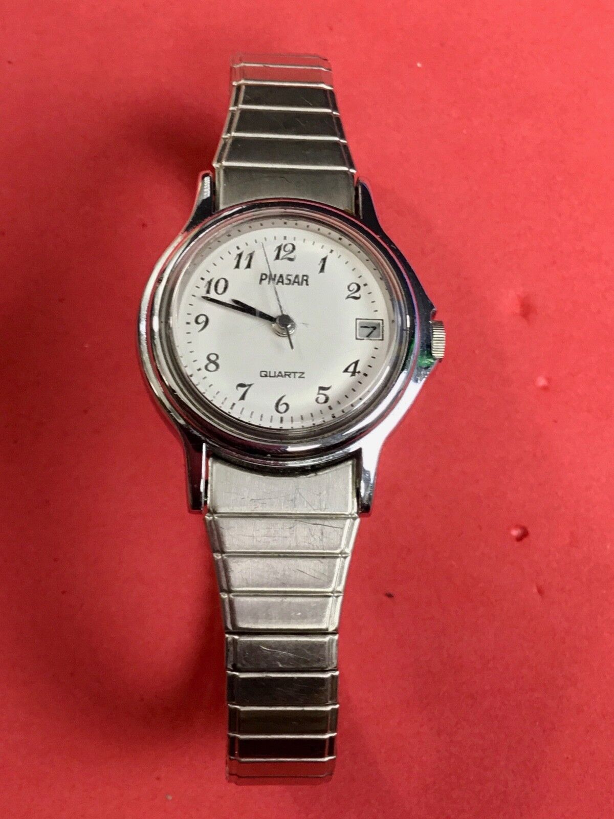 Vintage  Ladies Silver Tone Watch Phasar Quartz Date Stretch V227-0130 R 