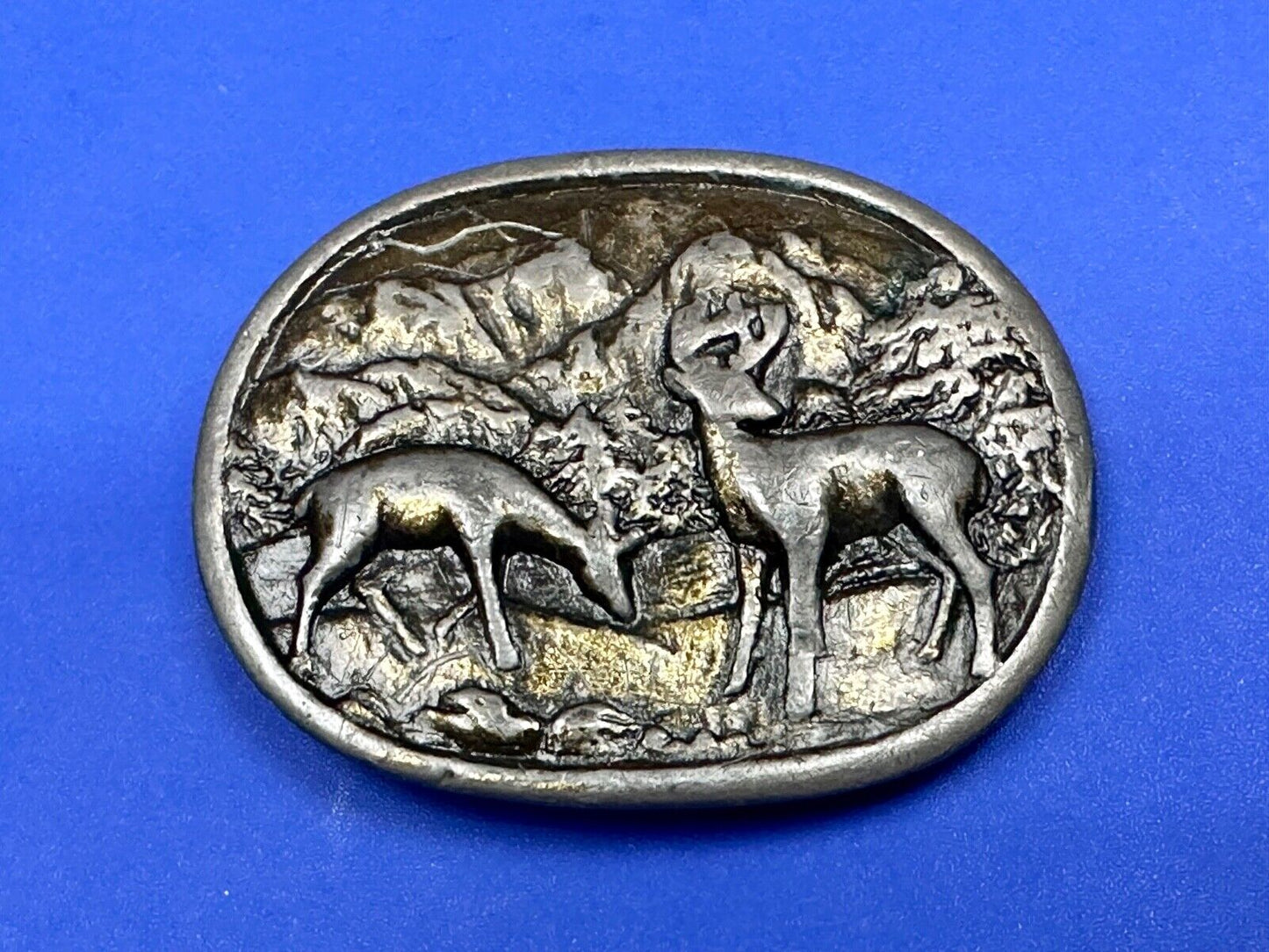 two deer grazing in nature - hunters western belt buckle