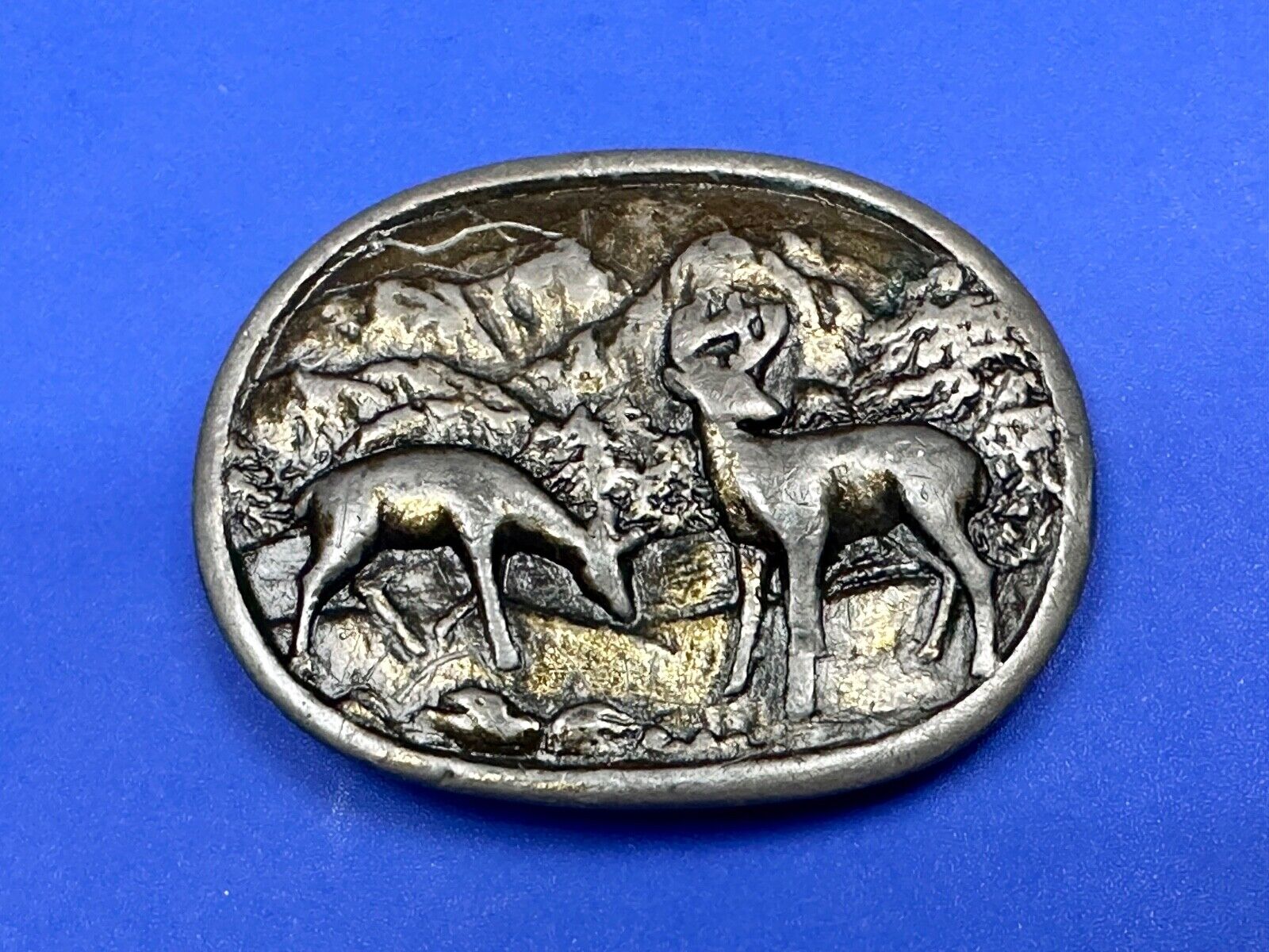 two deer grazing in nature - hunters western belt buckle