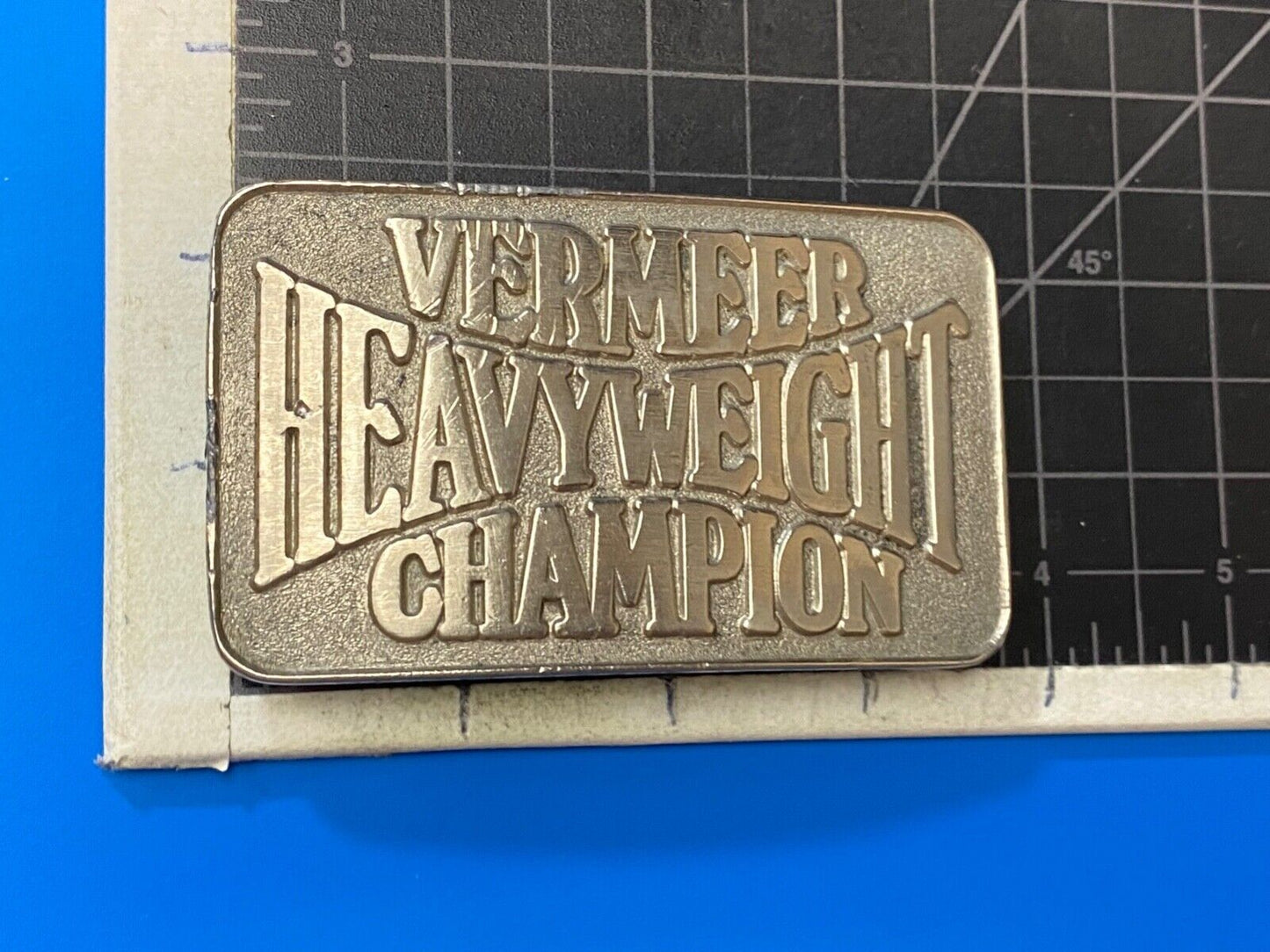 Vermeer Heavyweight Champion Belt Buckle by Spec Cast