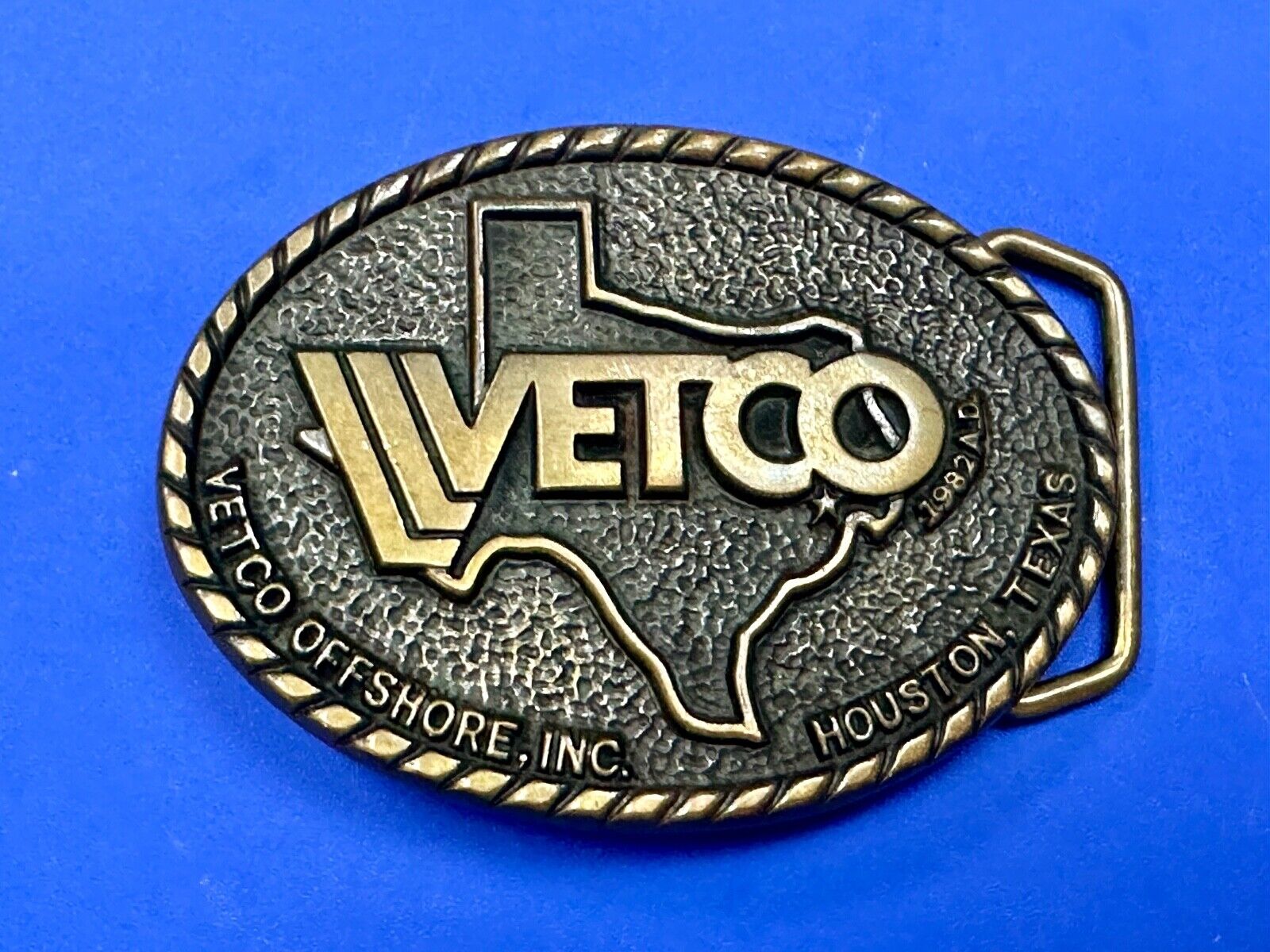 VETCO Houston Texas OffShore Inc animal health Vintage solid brass belt buckle
