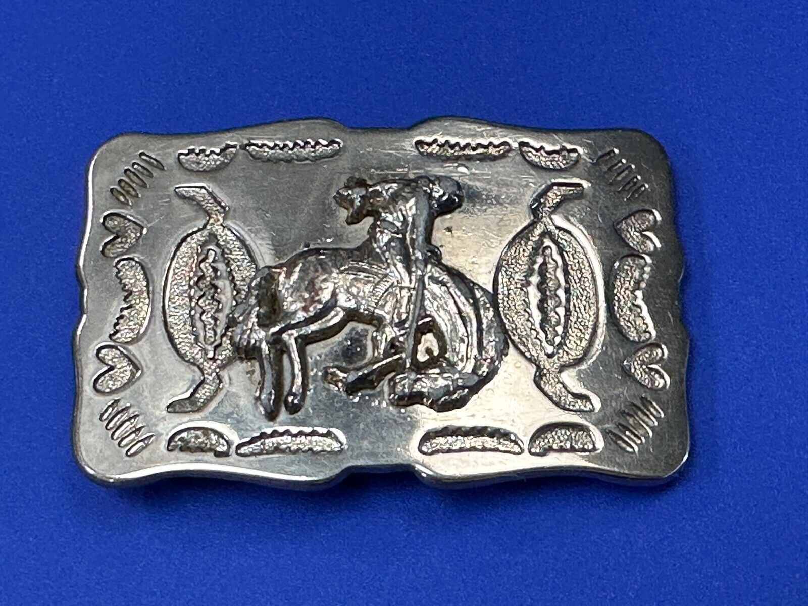 Vintage Cowboy Tipping Hat Head down Saddle Bronc western belt buckle