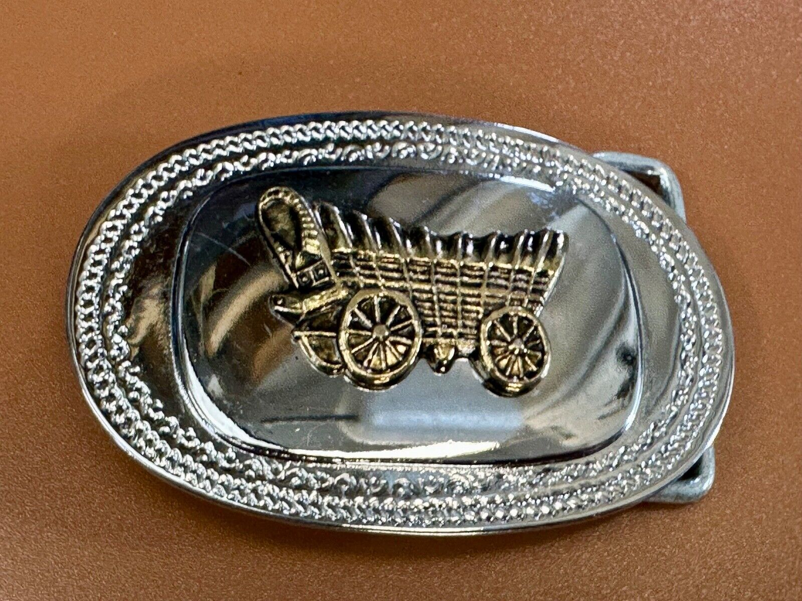 Vintage Covered Wagon - western two tone outlined belt buckle
