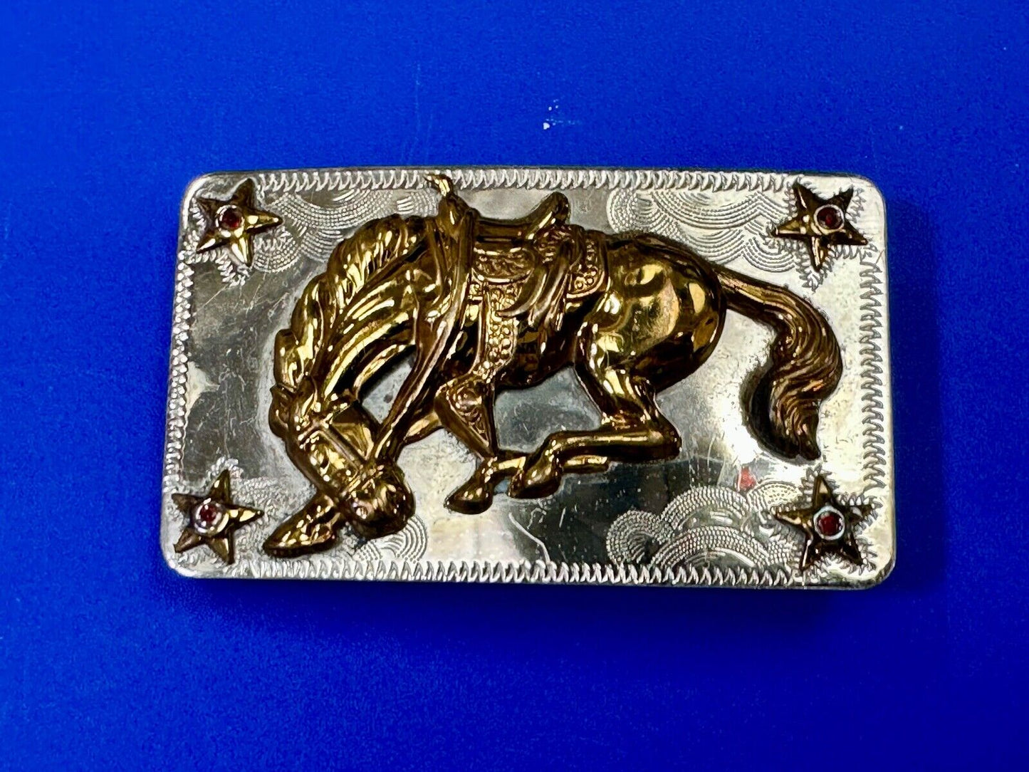 Vintage Horse w/  head down end of the trail Nickel Silver belt buckle w/ Stars