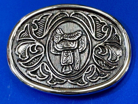 Vintage Cowboy's Horse Saddle ornate flower swirl oval belt buckle by Avon
