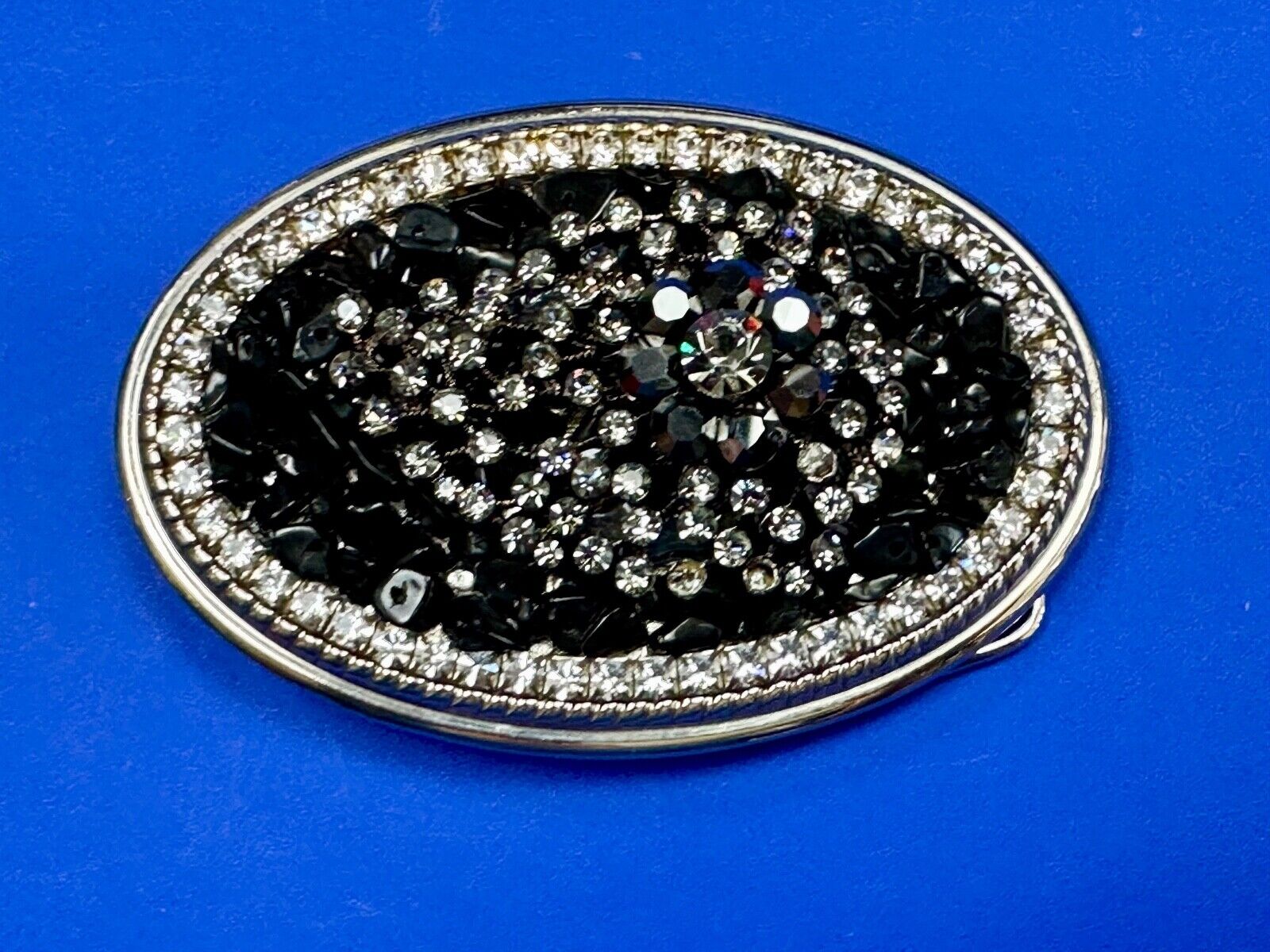 Artisan GHOST? Abstract animal head belt buckle covered in black rhinestone's