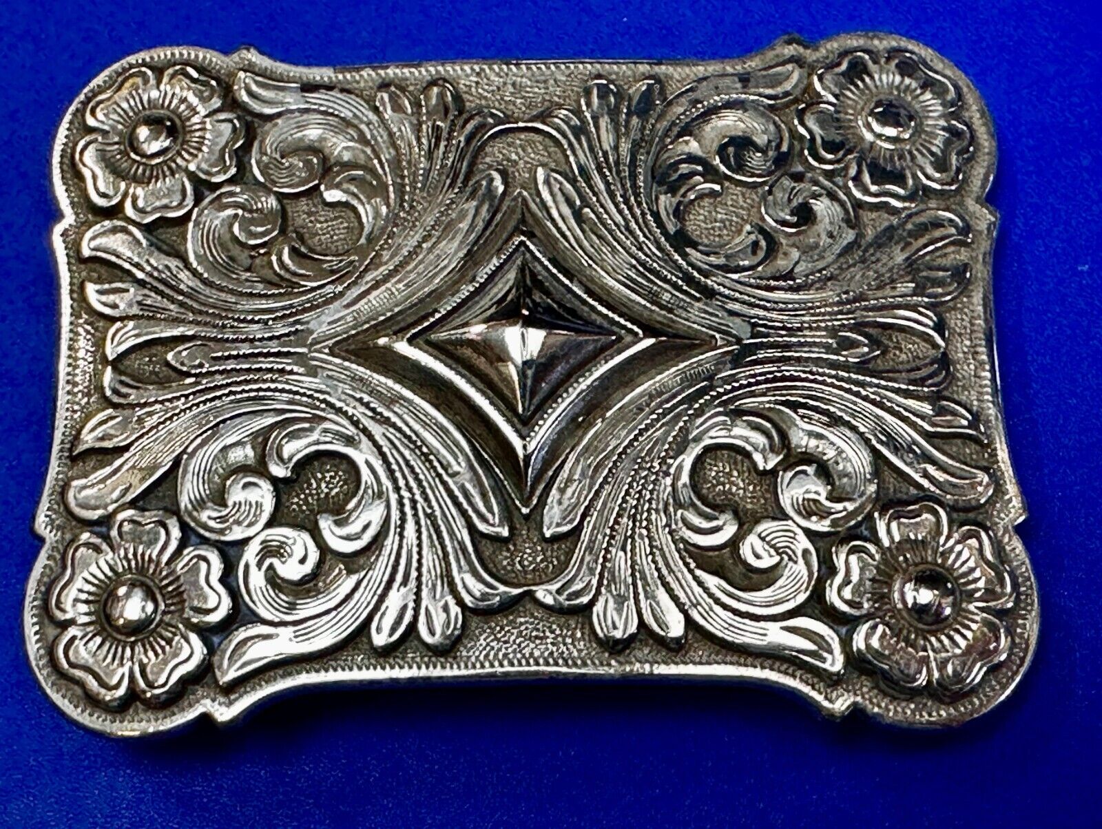 Vintage Ivan Brand Raised Diamond Center Flower Swirl Design Belt Buckle