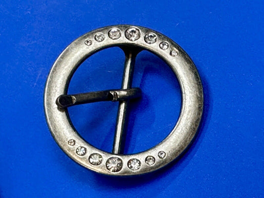 2" Round silver tone belt buckle with graduated rhinestone sized