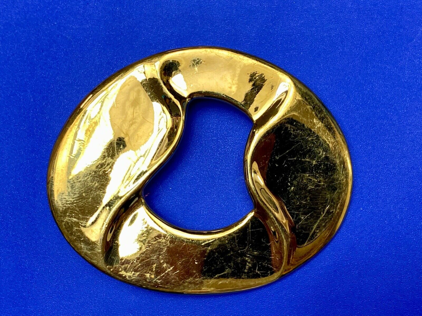 Artist Ginnie Johansen signed gold color abstract oval belt scarf slide