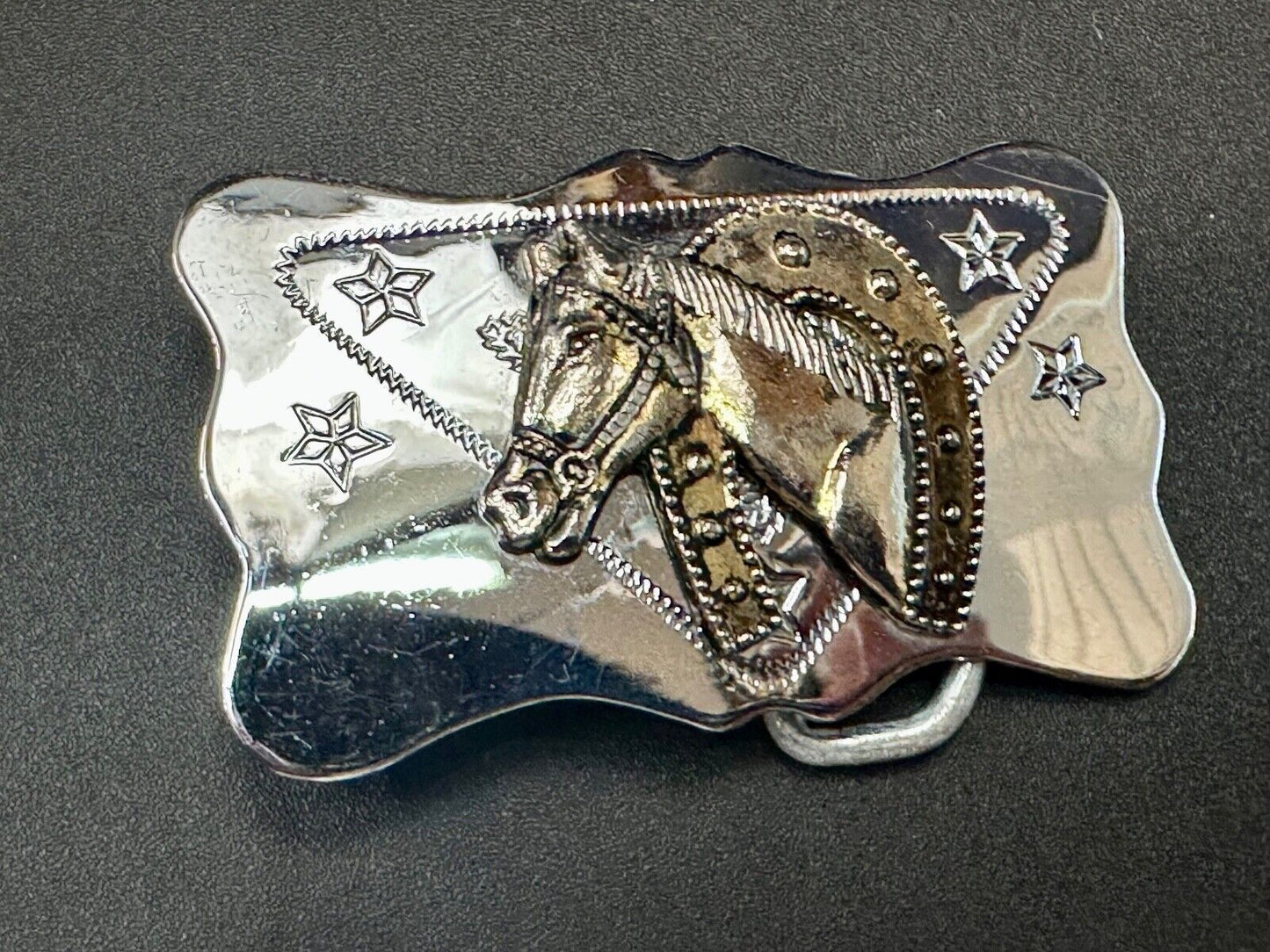 Vintage horse head through lucky horseshoe on reflective western belt buckle