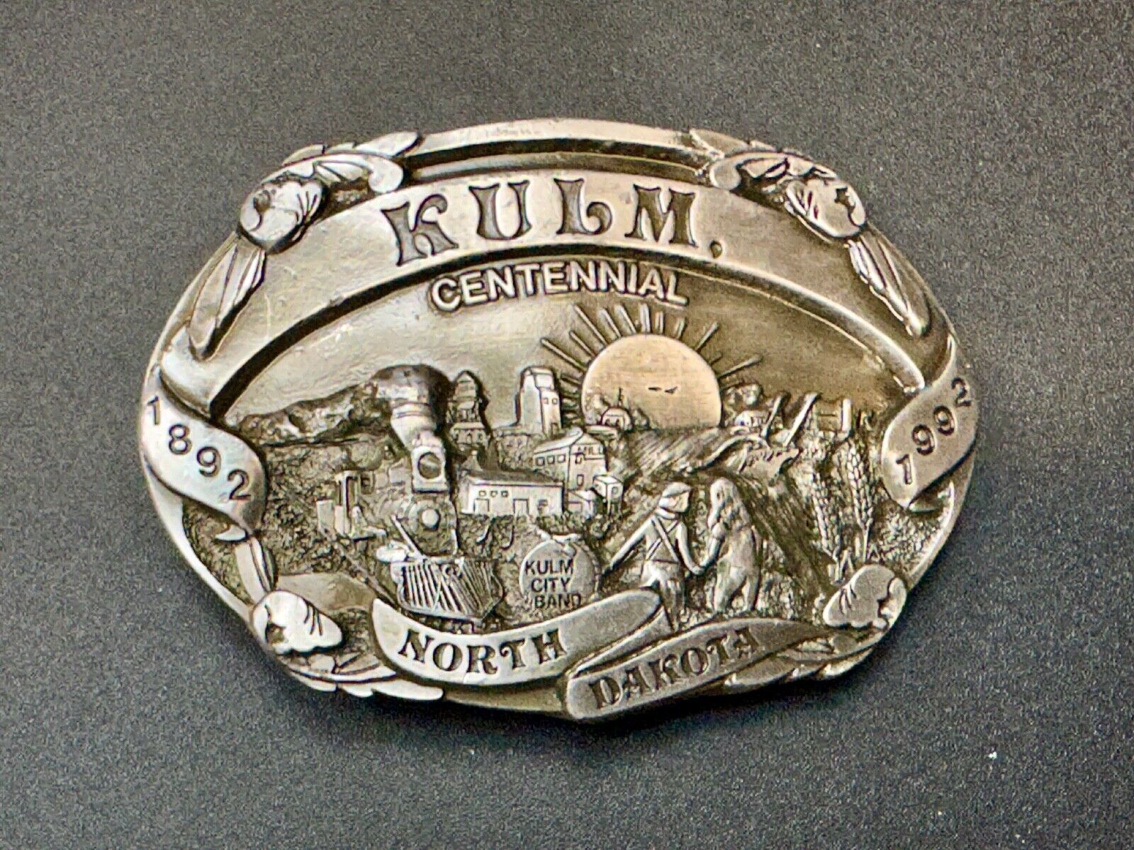 Vintage KULM North Dakota commemorative belt buckle by DART inc.