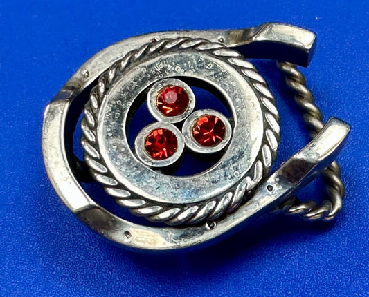 artisan circle pattern rope centerpiece red dots horseshoe shaped belt buckle