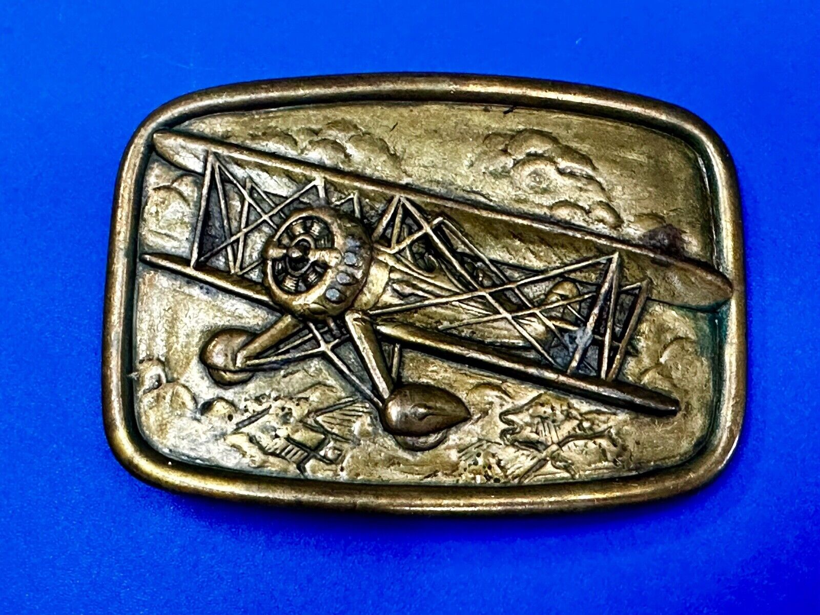 Airplane - Pilots Plane Bi_Wing Avon Vintage 1985 Flying Americana Belt Buckle