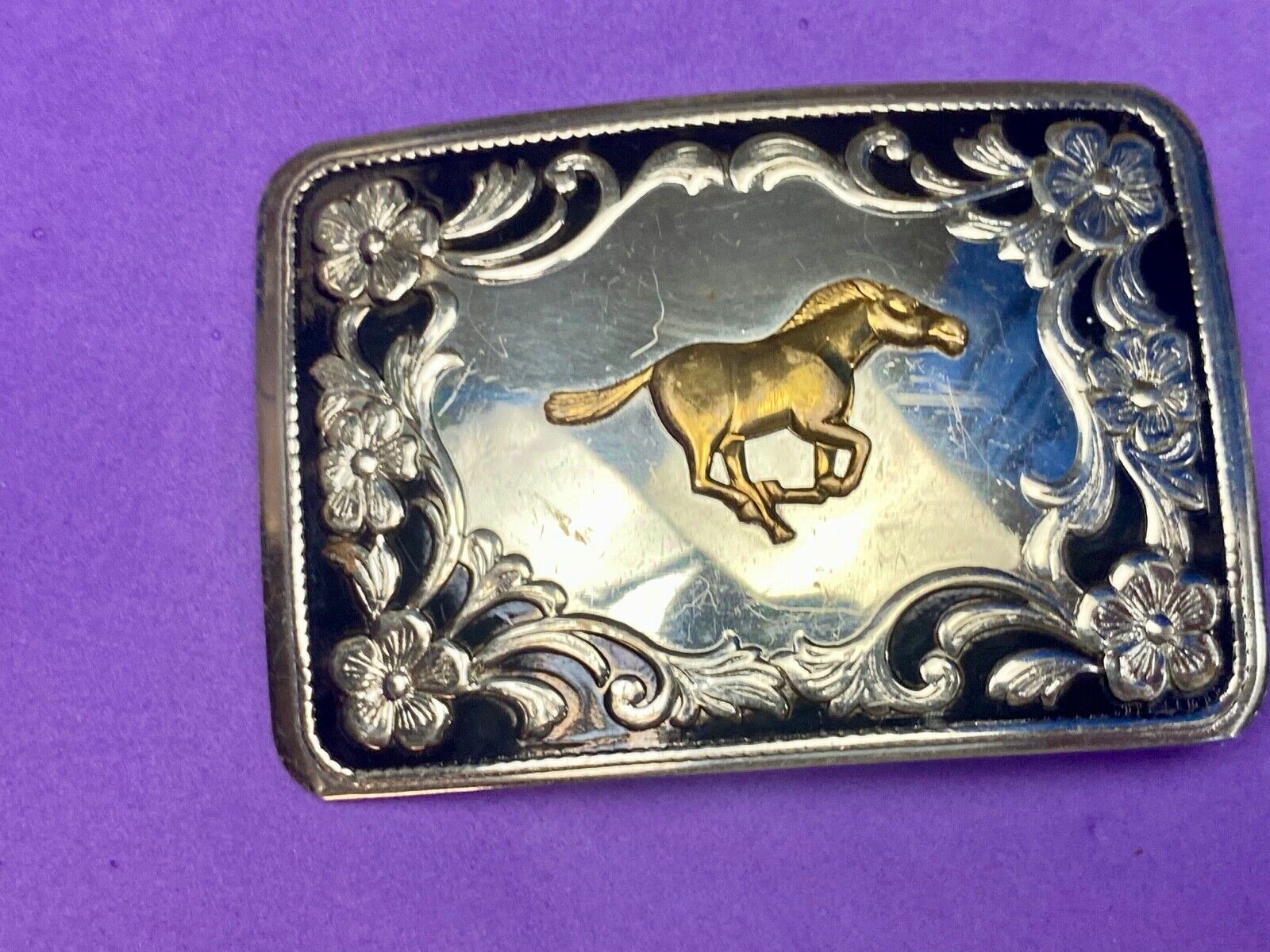 Antique Horse western Nickle Silver and black paint flower swirl belt buckle 