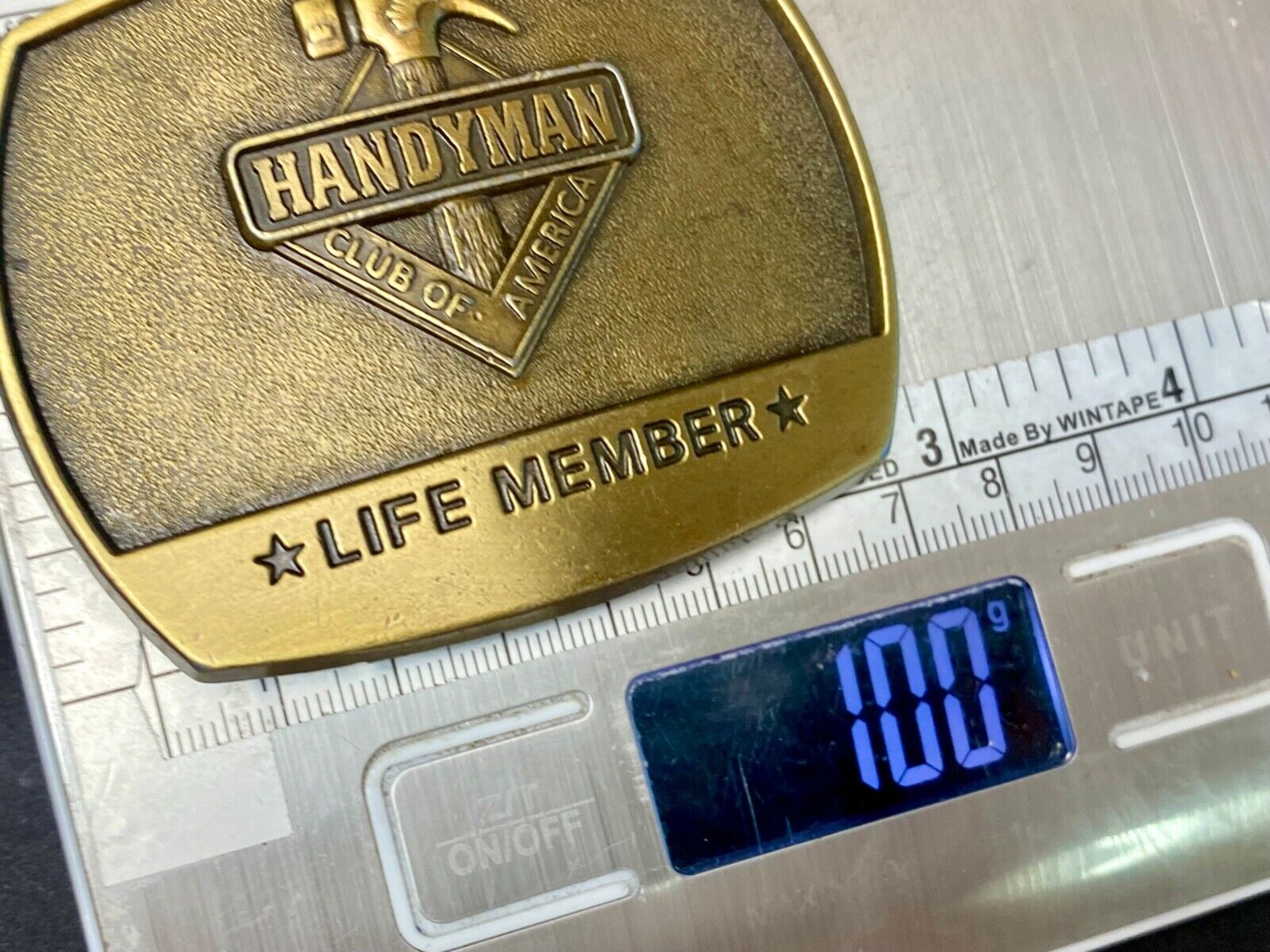 vintage handyman club of America Hammer Ruler- life member belt buckle