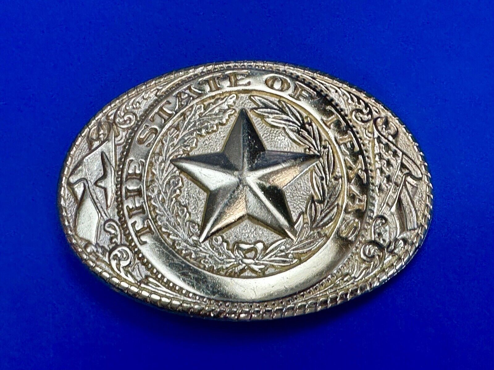 The Great State of Texas - Lone Star Flags seal gold & white color belt buckle