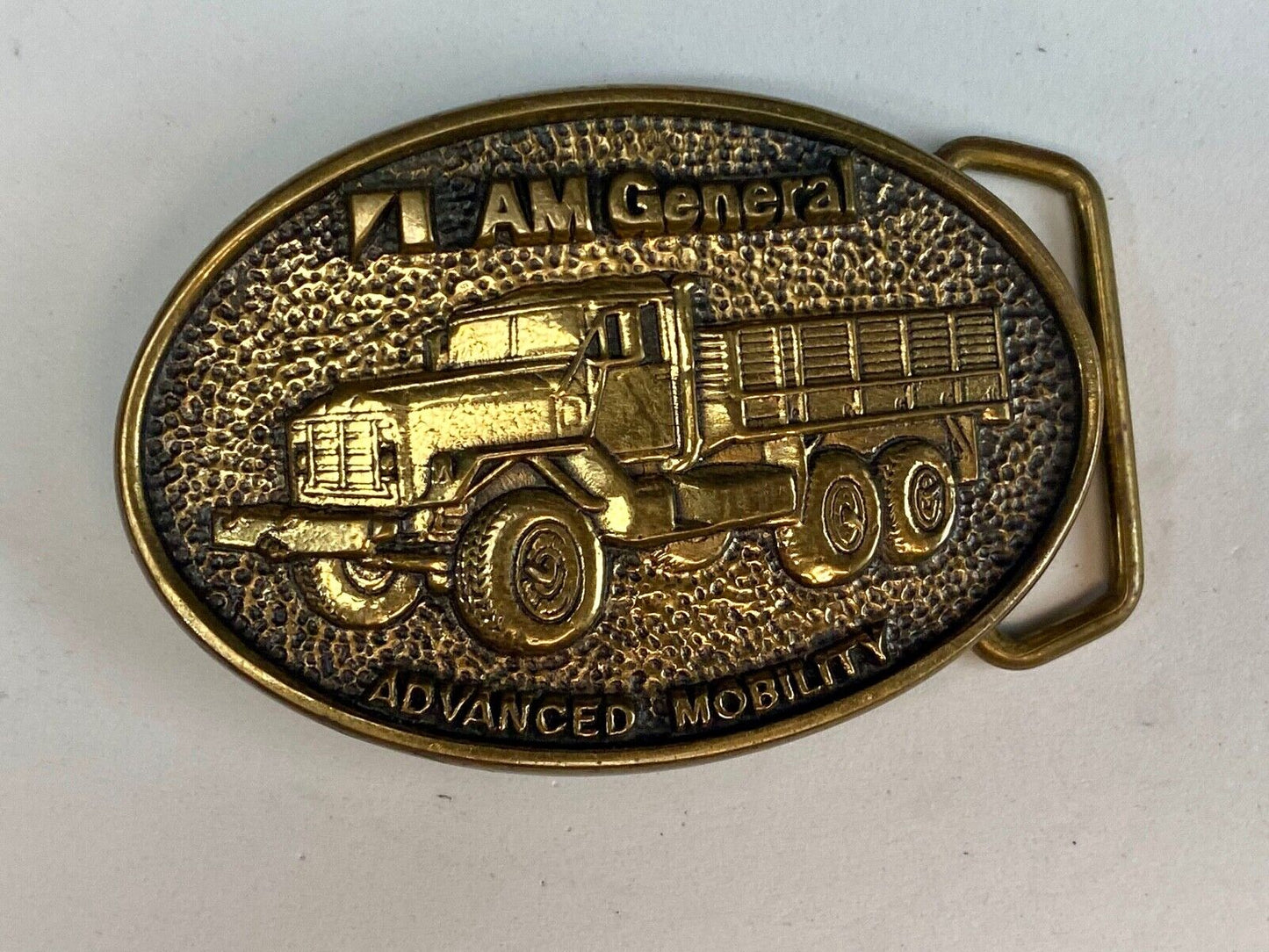 AM General Advanced Mobility belt buckle 2nd in a collector series 5 Ton Trucks 