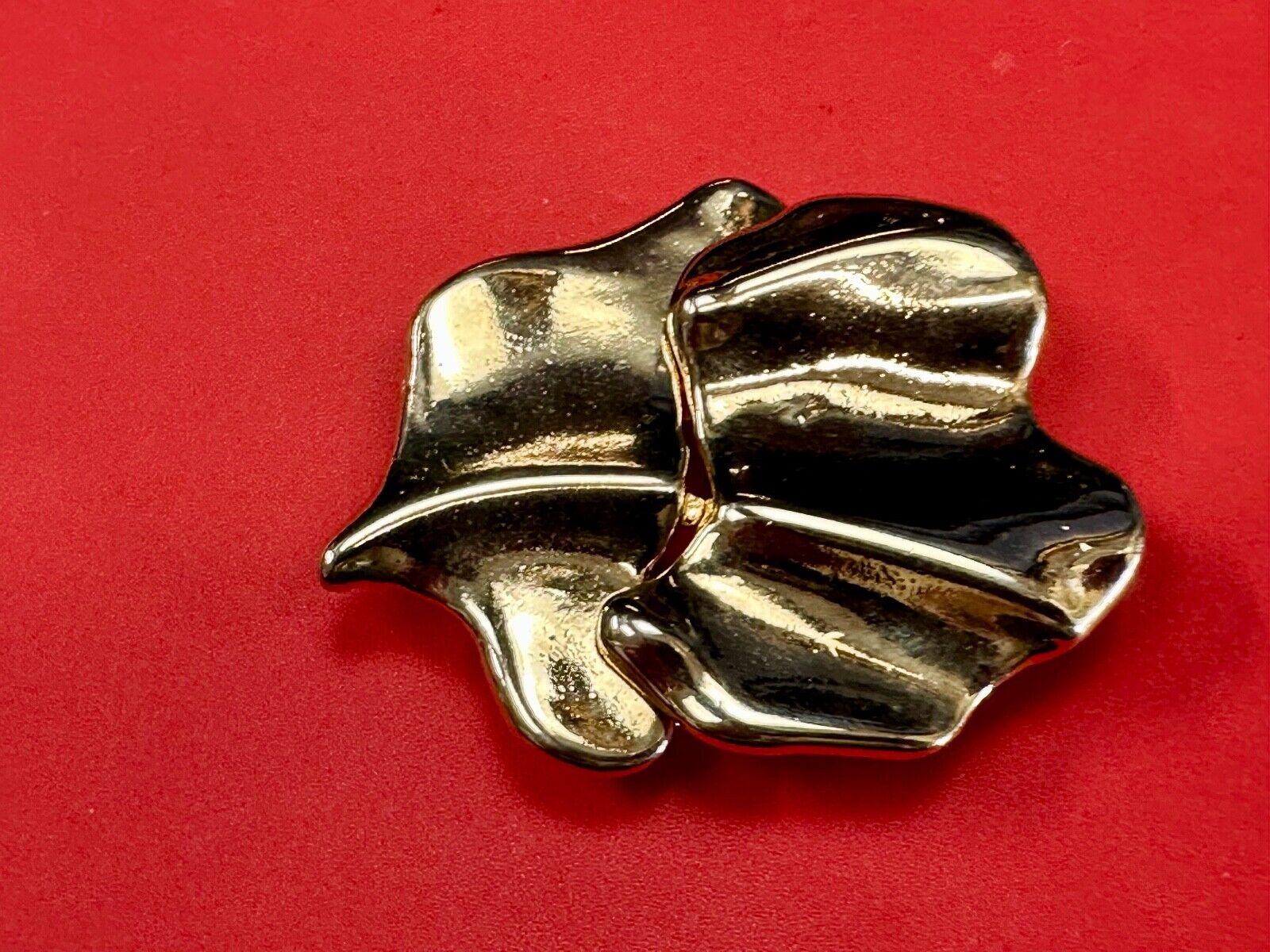 Two-piece interlocking gold tone leaf swirl theme belt slide buckle signed _____