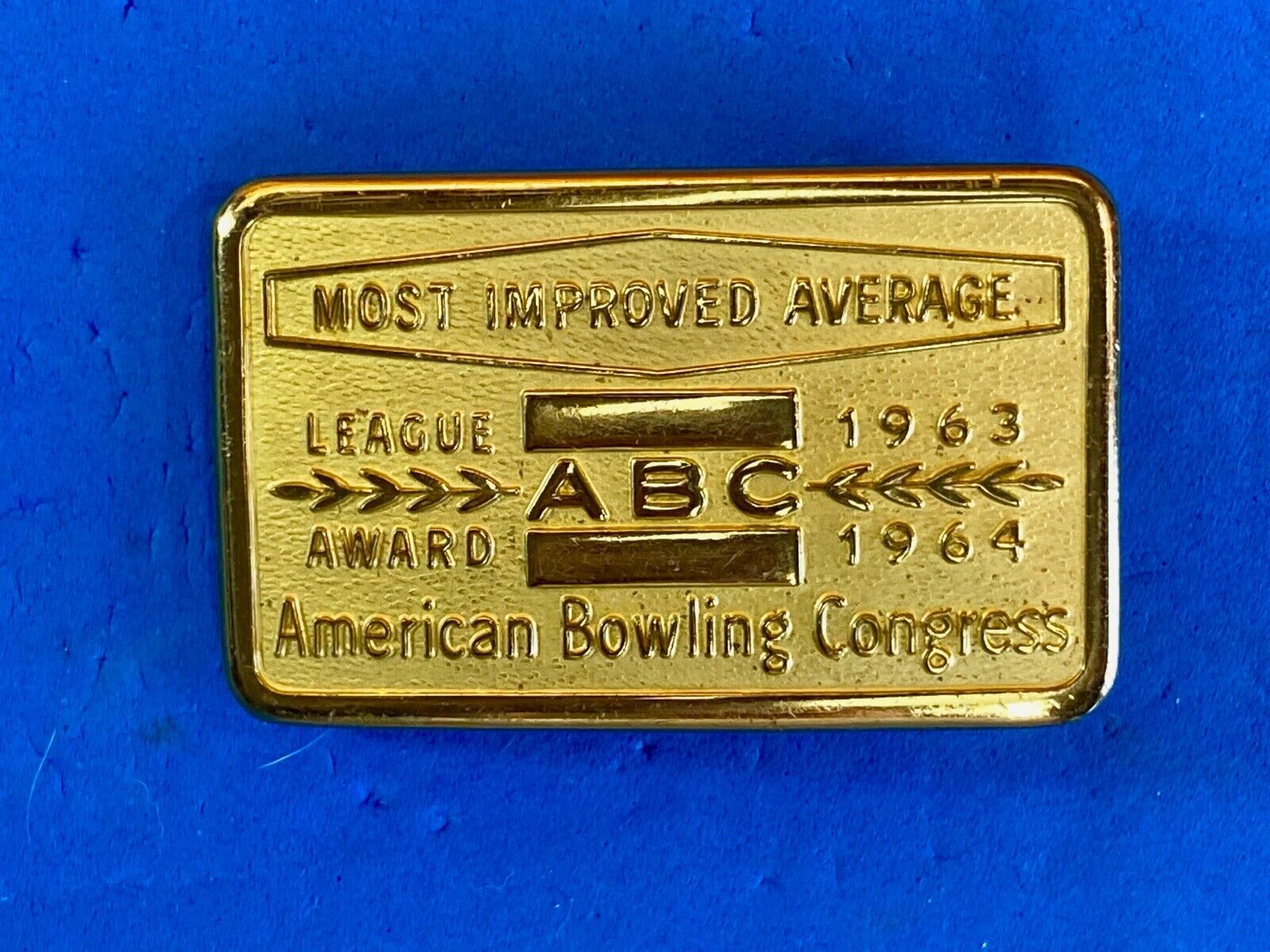 1963, 64 American Bowling Congress Most Improved Average Award Belt Buckle