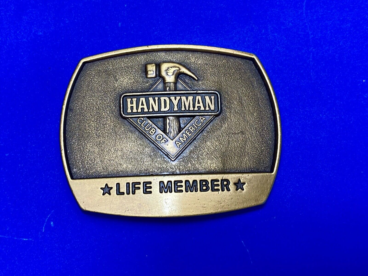 vintage handyman club of America Hammer Ruler- life member belt buckle