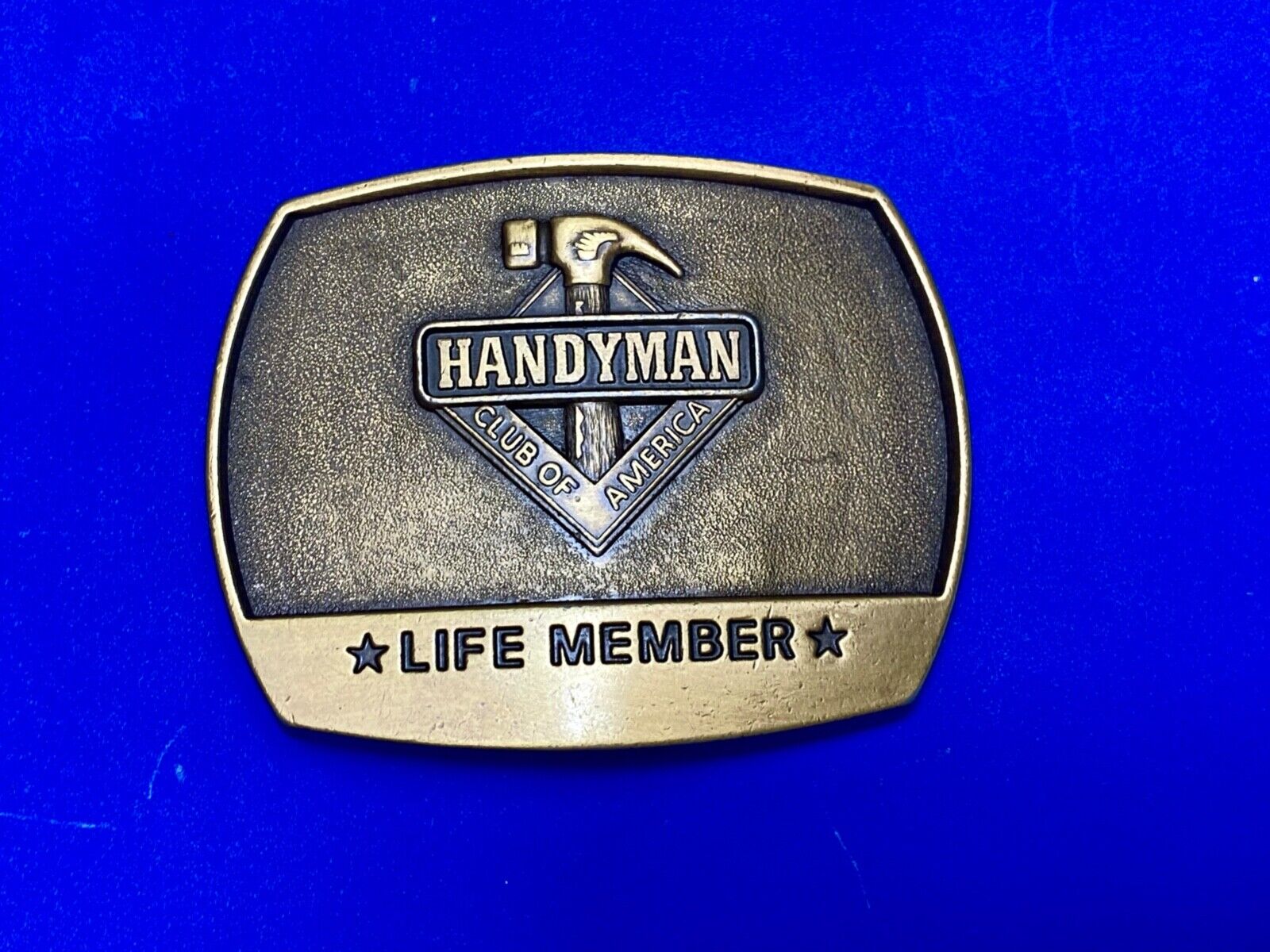 vintage handyman club of America Hammer Ruler- life member belt buckle