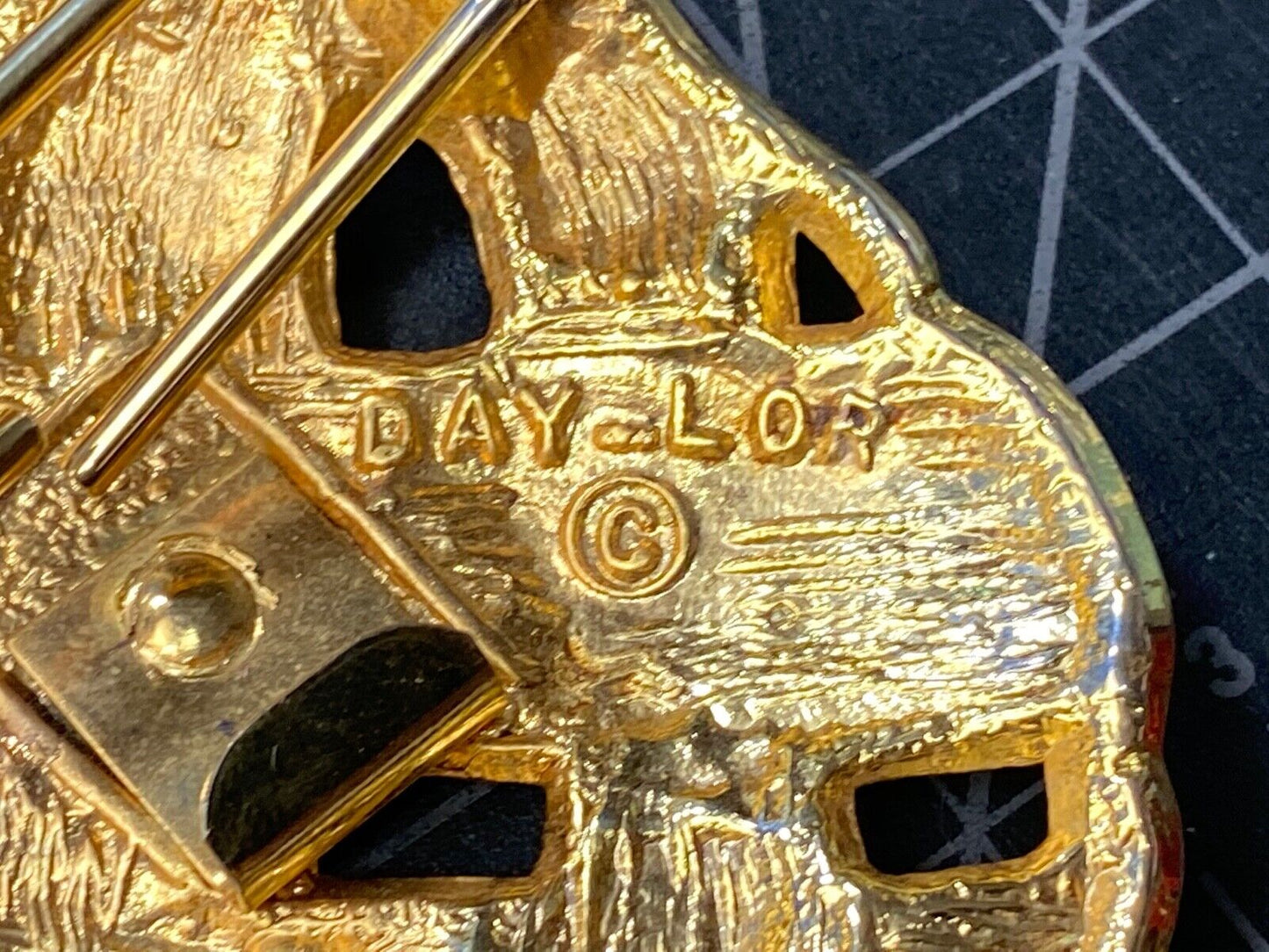 Vintage Day-Lor black and gold belt buckle 