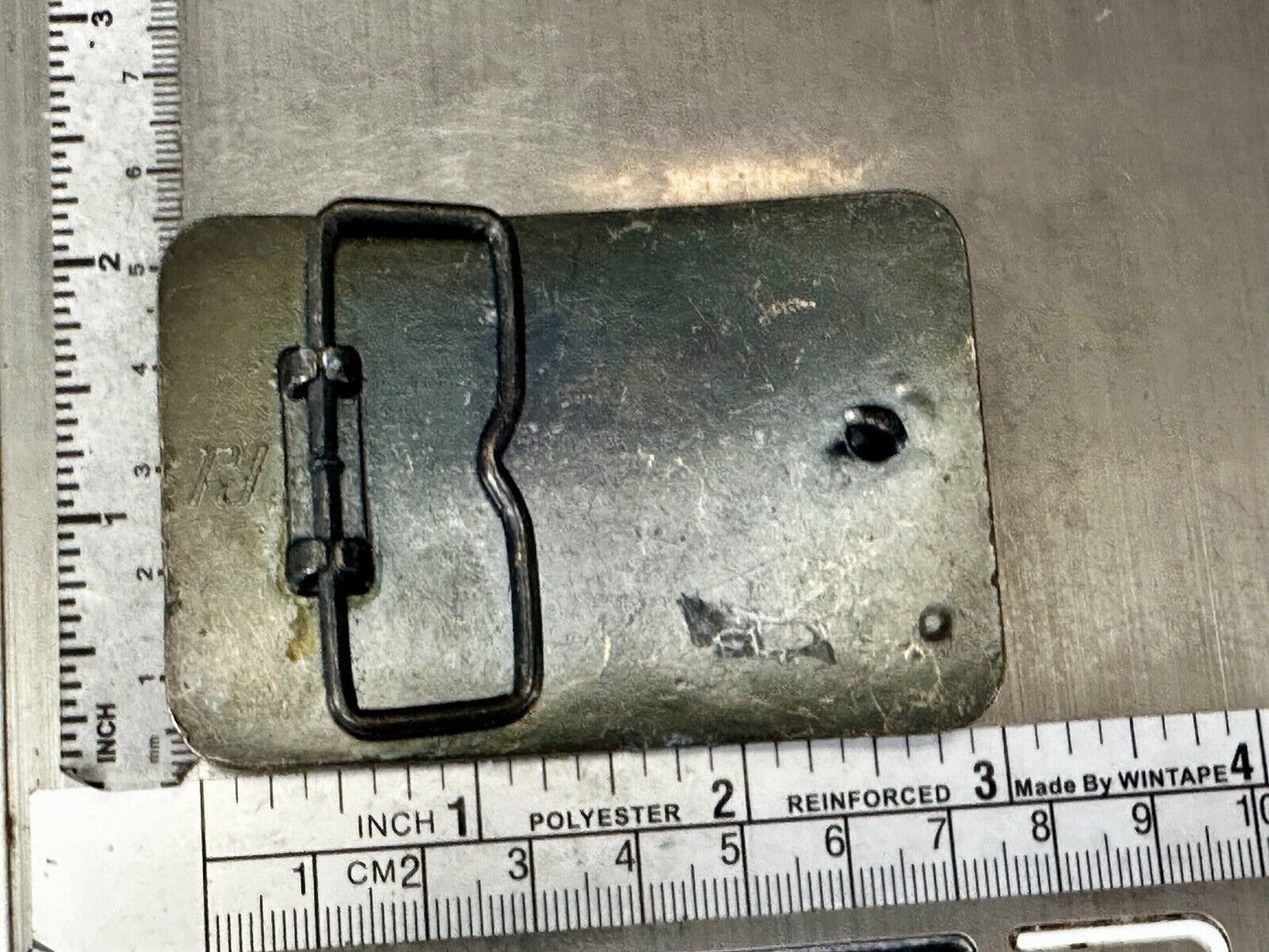 Austin Texas Distributing and Manufacturing 1984 Advertisement Promo Belt Buckle