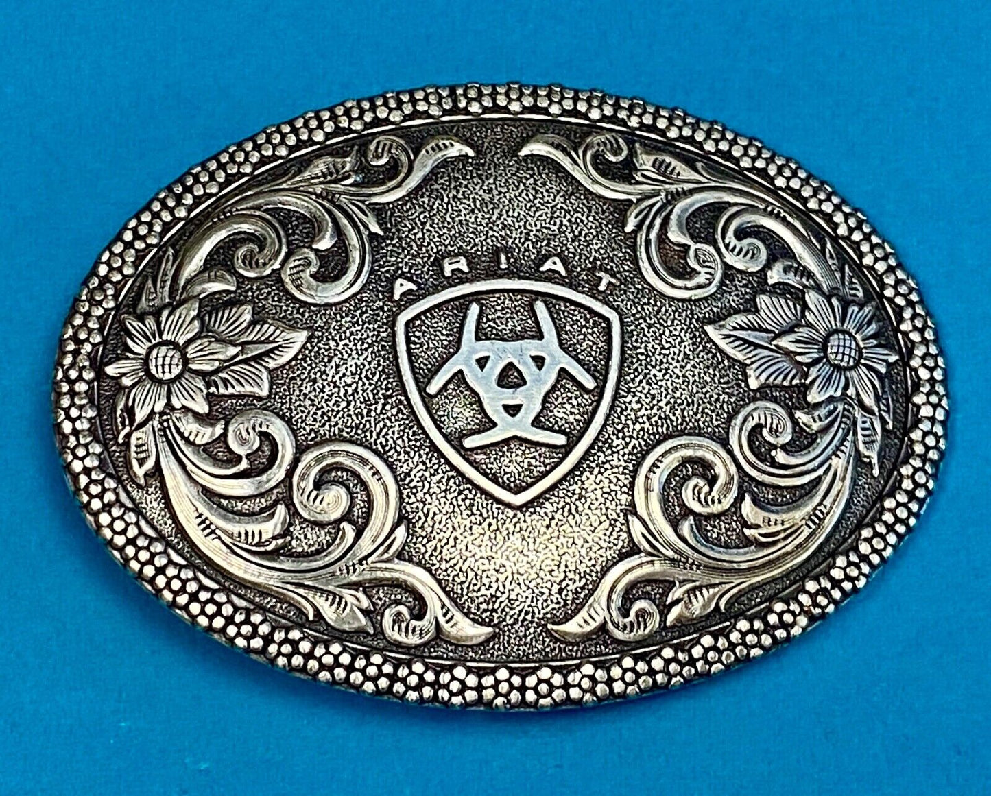 Ariat Western Oval Silver Tone Belt Buckle With Filigree Shield & Berry Edge