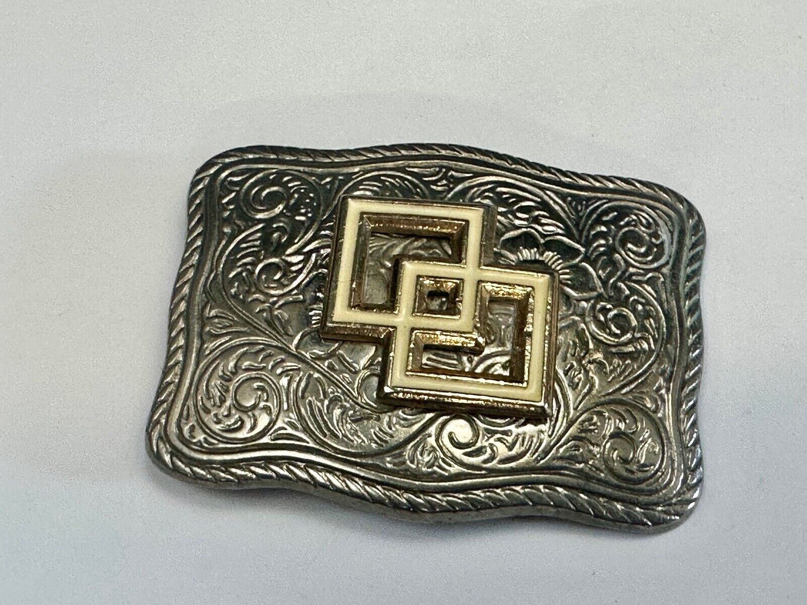 Two Squares pattern - centered in western flower swirl design belt buckle