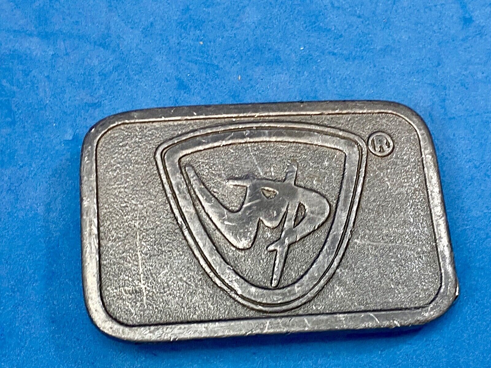 unknown to me, vintage metal belt buckle by HitLine INC.   Company Logo?