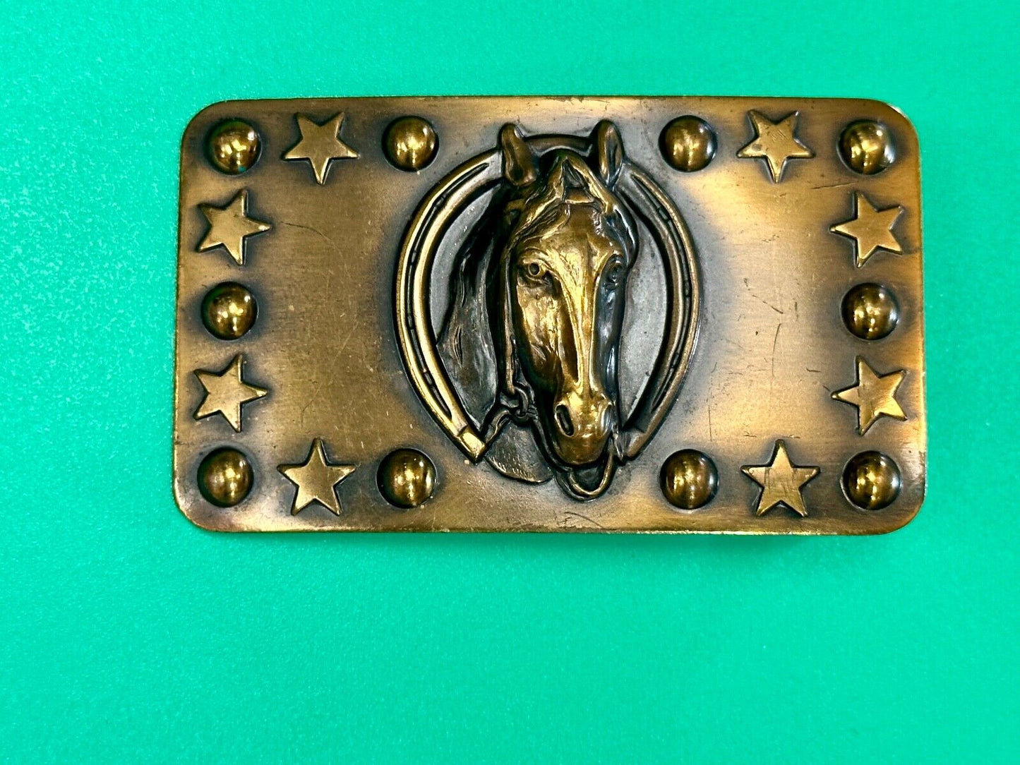Vintage Horse head belt buckle with stars and circles boarder