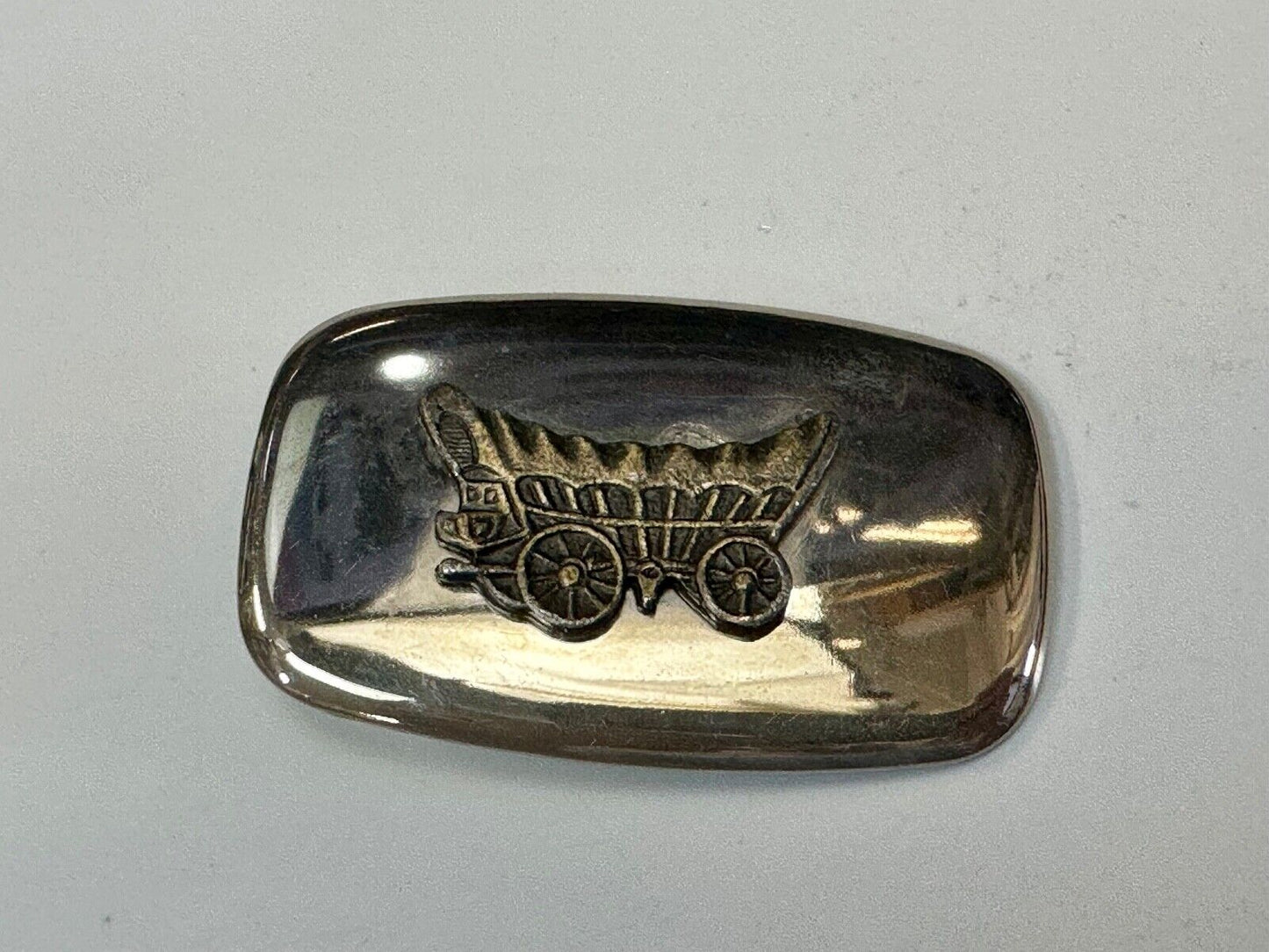 70s Covered Wagon two tone reflective rounded corner USA made belt buckle