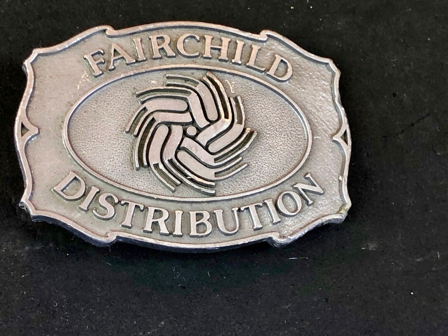 Vintage Fairchild Distribution company logo promotional belt buckle 