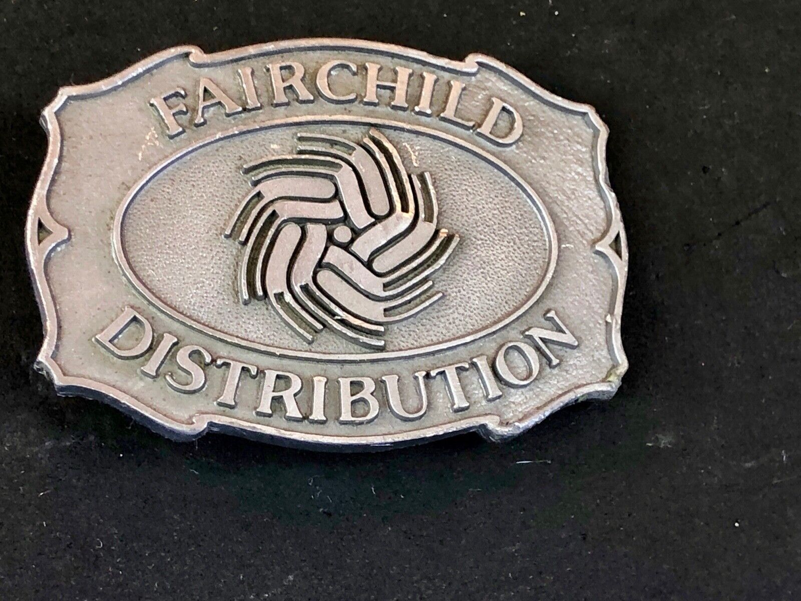 Vintage Fairchild Distribution company logo promotional belt buckle 
