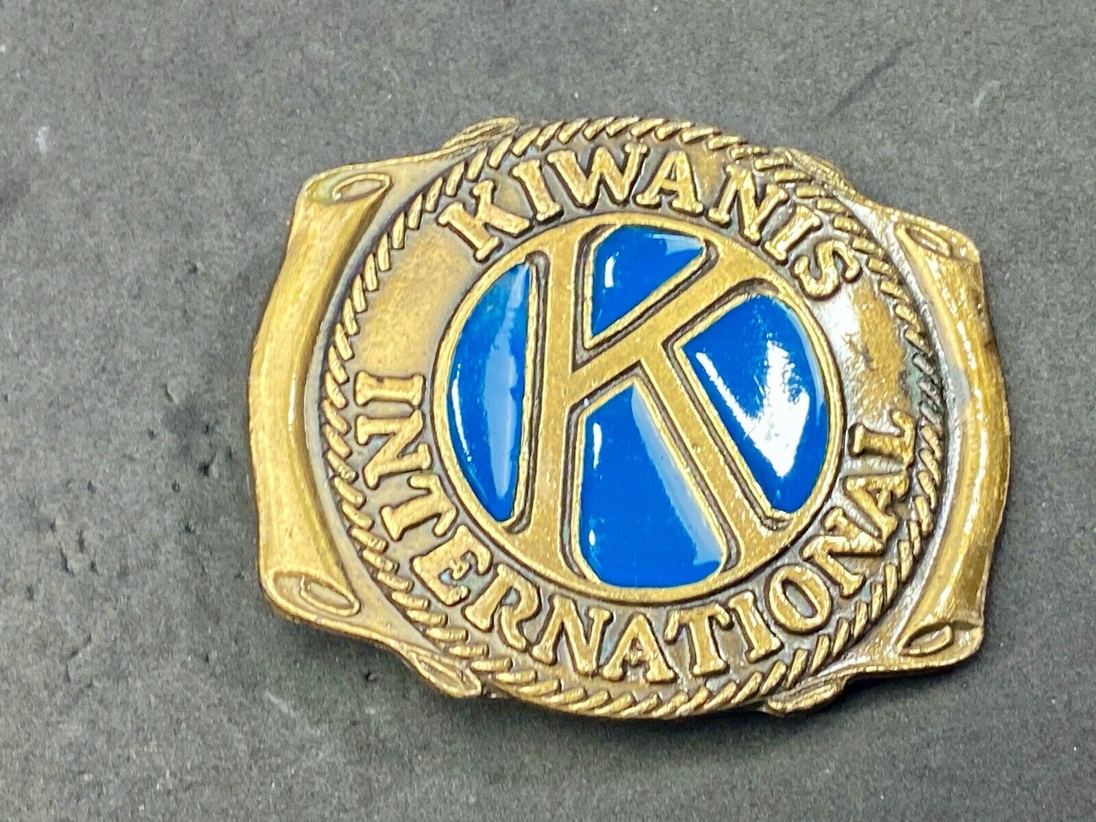 Vintage Kiwanis Club international blue enamel cut out belt buckle 