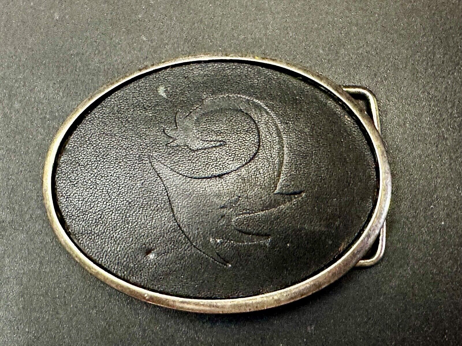 Unknown to me Animal Emblem Logo? Black Faux? leather Silver Tone Belt Buckle