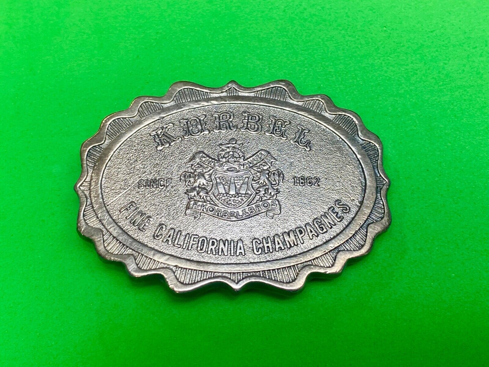 vintage Korbel Fine California champagne belt buckle by Wyoming Studio Art