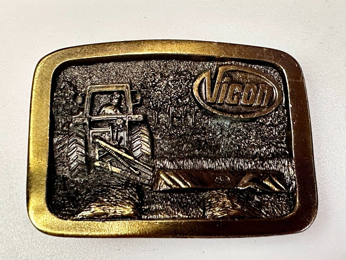 Vicon Disk Mower Tractor Promotional Belt Buckle by Premium Specialties