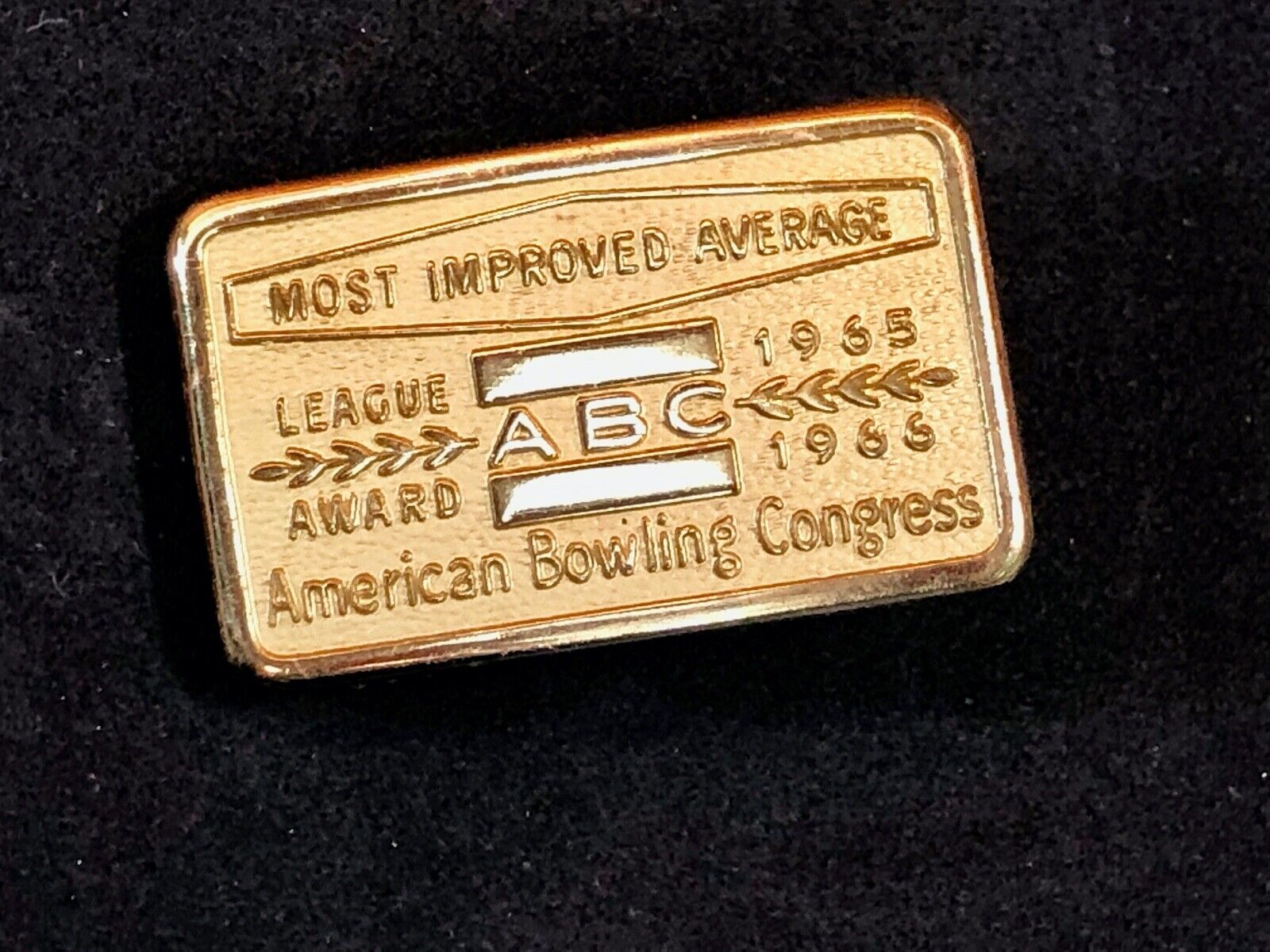 AMERICAN BOWLING CONGRESS MOST IMPROVED AVERAGE ABC LEAGUE AWARD BELT BUCKLE