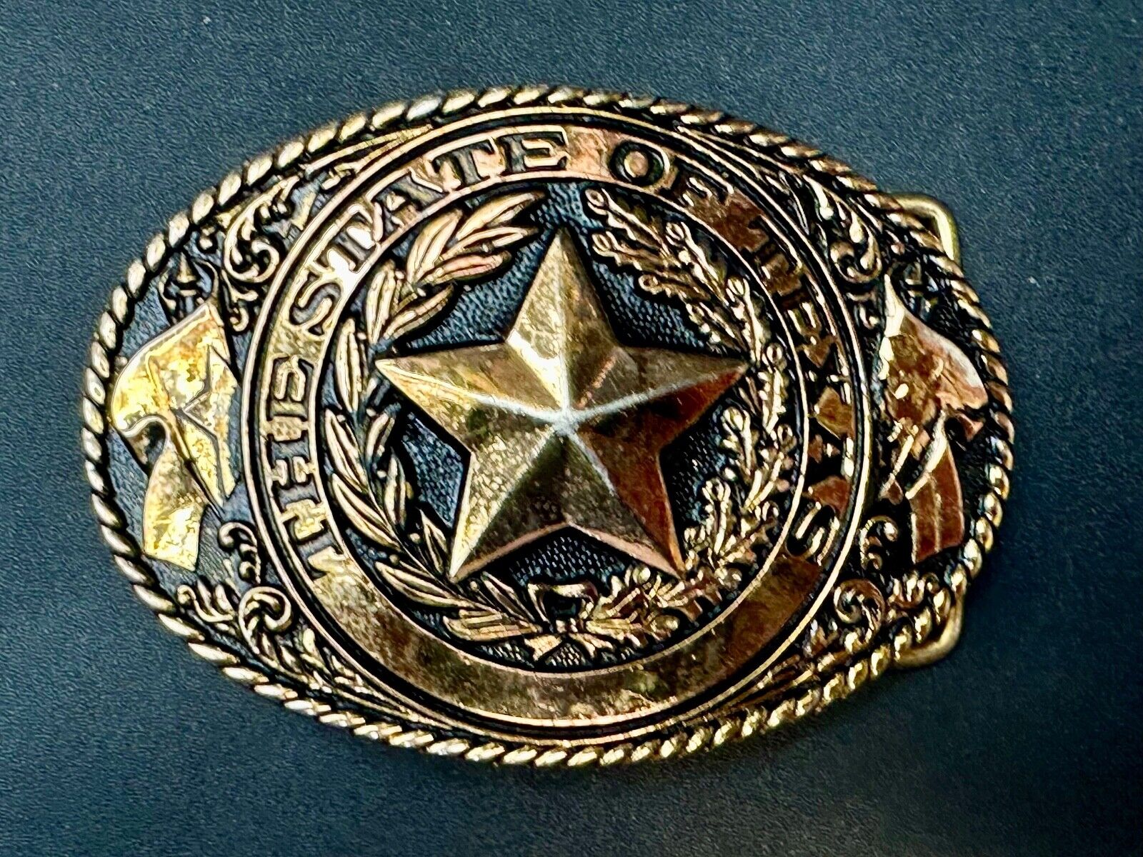 TEXAS State Pride - RAISED 3D STAR centered in brass tone oval Belt Buckle
