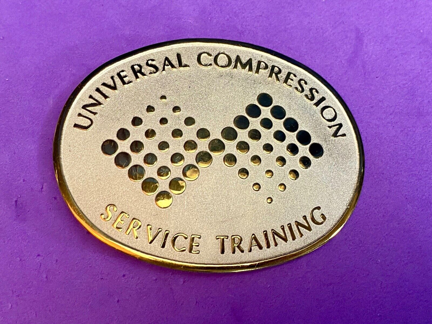 Universal Compression Service Training Company Award Belt Buckle