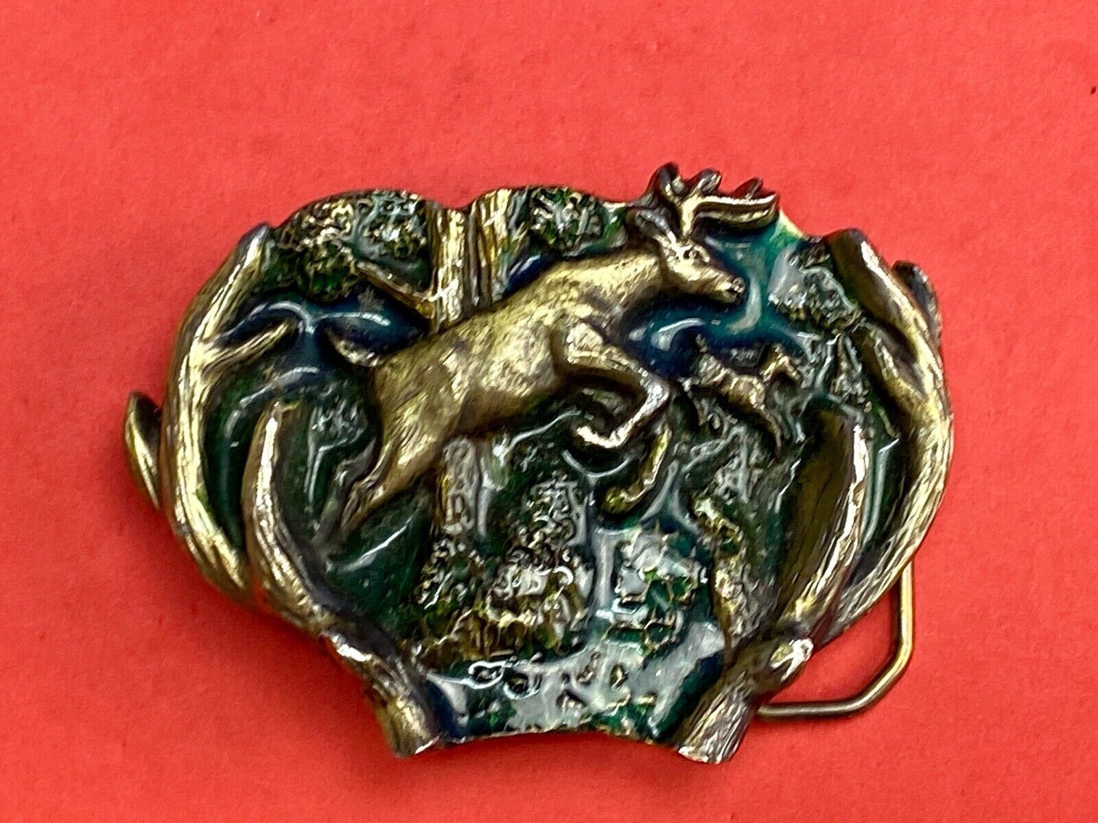 VINTAGE 1982 JUMPING DEER THROUGH ANTLERS - The Great American belt buckle Co. 