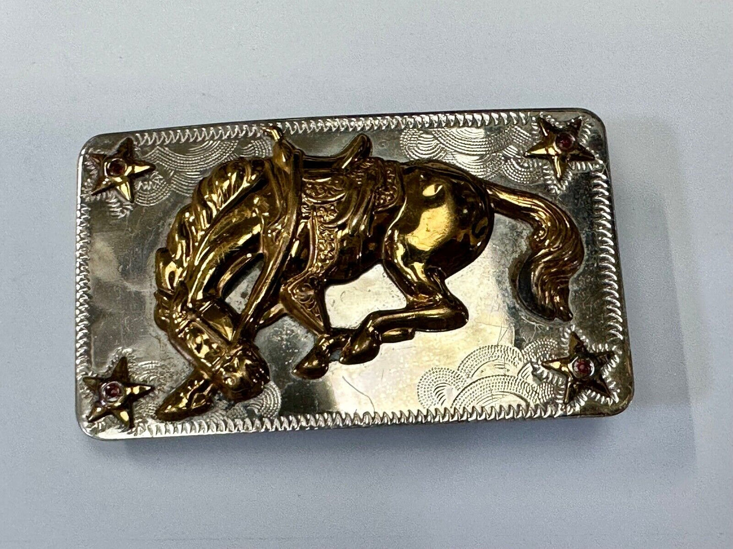 Vintage Horse w/  head down end of the trail Nickel Silver belt buckle w/ Stars