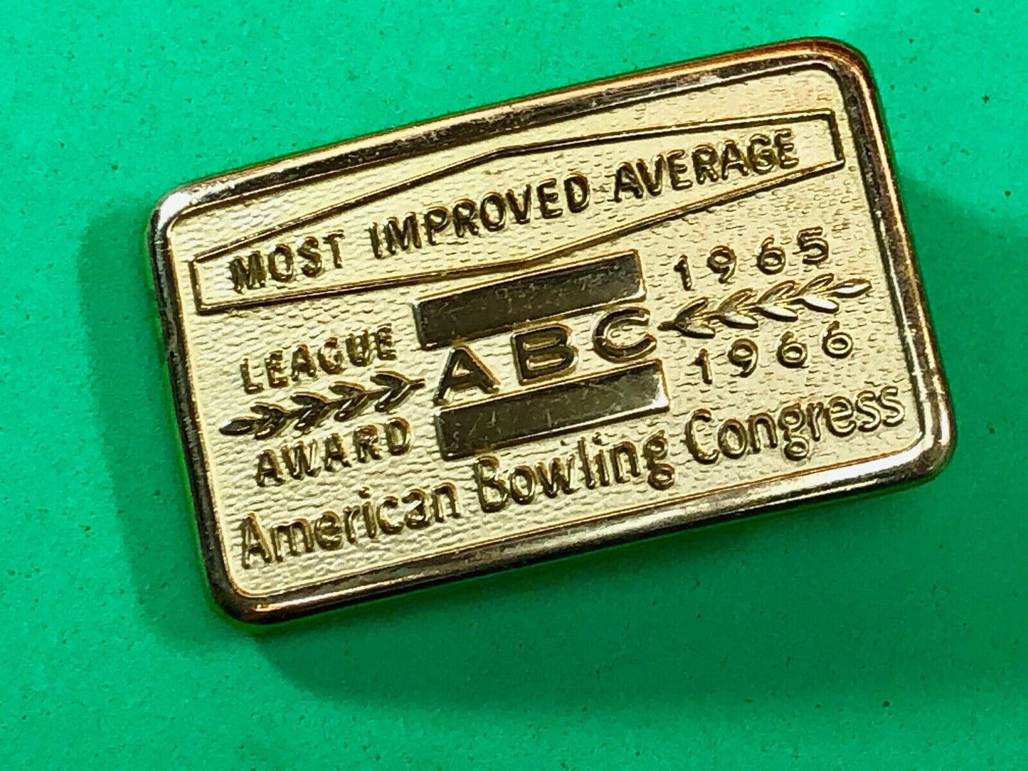 AMERICAN BOWLING CONGRESS MOST IMPROVED AVERAGE ABC LEAGUE AWARD BELT BUCKLE
