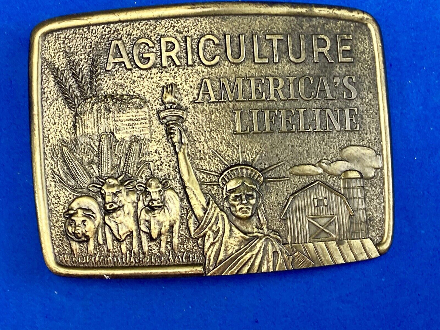 AGRICULTURE, Americas Lifeline belt buckle by Farmhand - Statue of liberty 