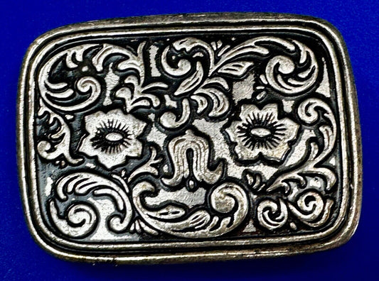 Vintage black and silver tone western flower floral theme cowboys belt buckle